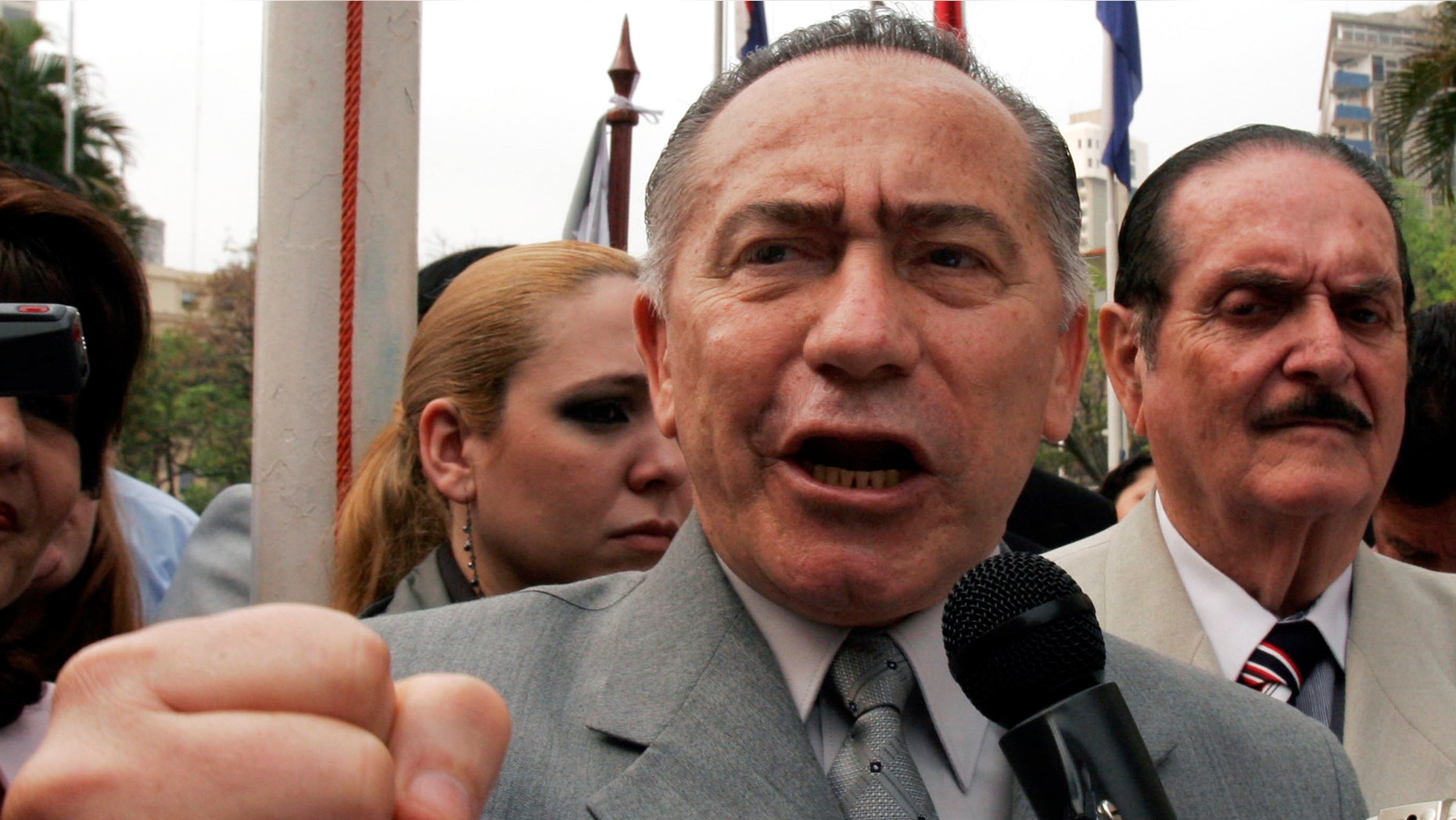 FILE - In this Sept. 17, 2007, file photo, Head of Paraguay's Armed Forces, Gen. Lino Oviedo, talks to supporters during The UNACE, Ethical Citizens Union party's fifth anniversary in Asuncion, Paraguay.(AP Photo/Jorge Saenz, File)