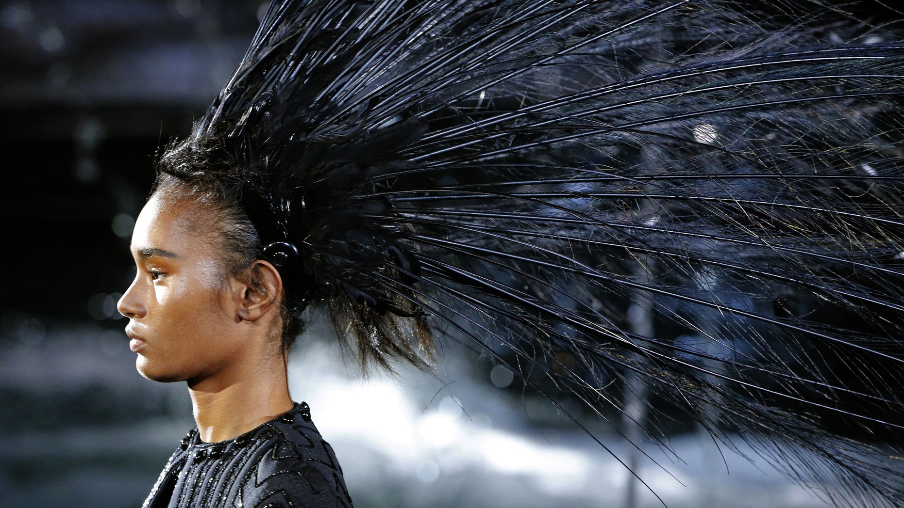 A model presents a creation as part of Vuitton's ready-to-wear Spring/Summer 2014 fashion collection, presented Wednesday, Oct. 2, 2013 in Paris.