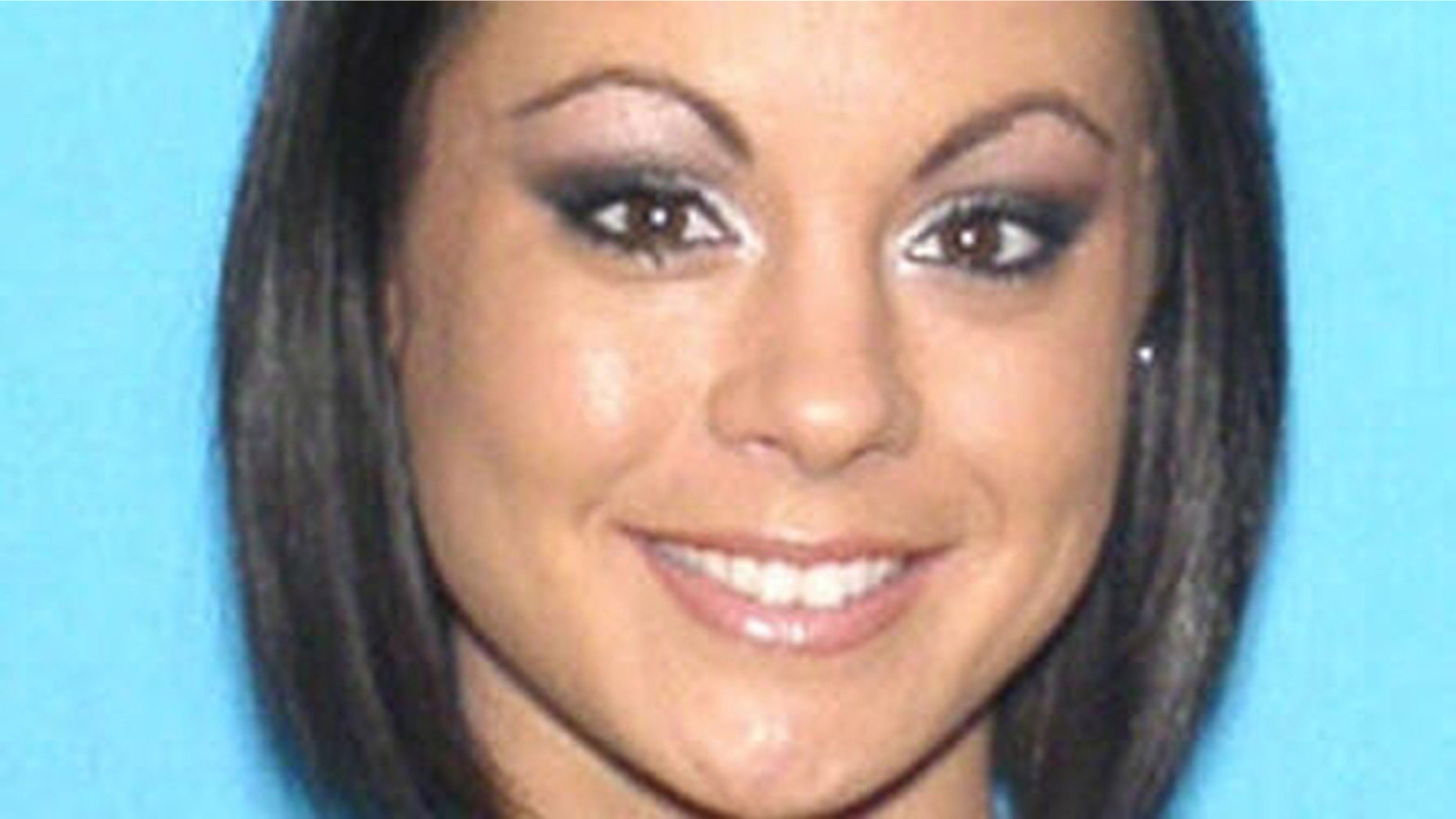 FILE- This photo shows Michelle Parker, of Orlando, Fla., who disappeared on the same day an episode of 'The People's Court' TV show aired featuring her and her ex-fiance.