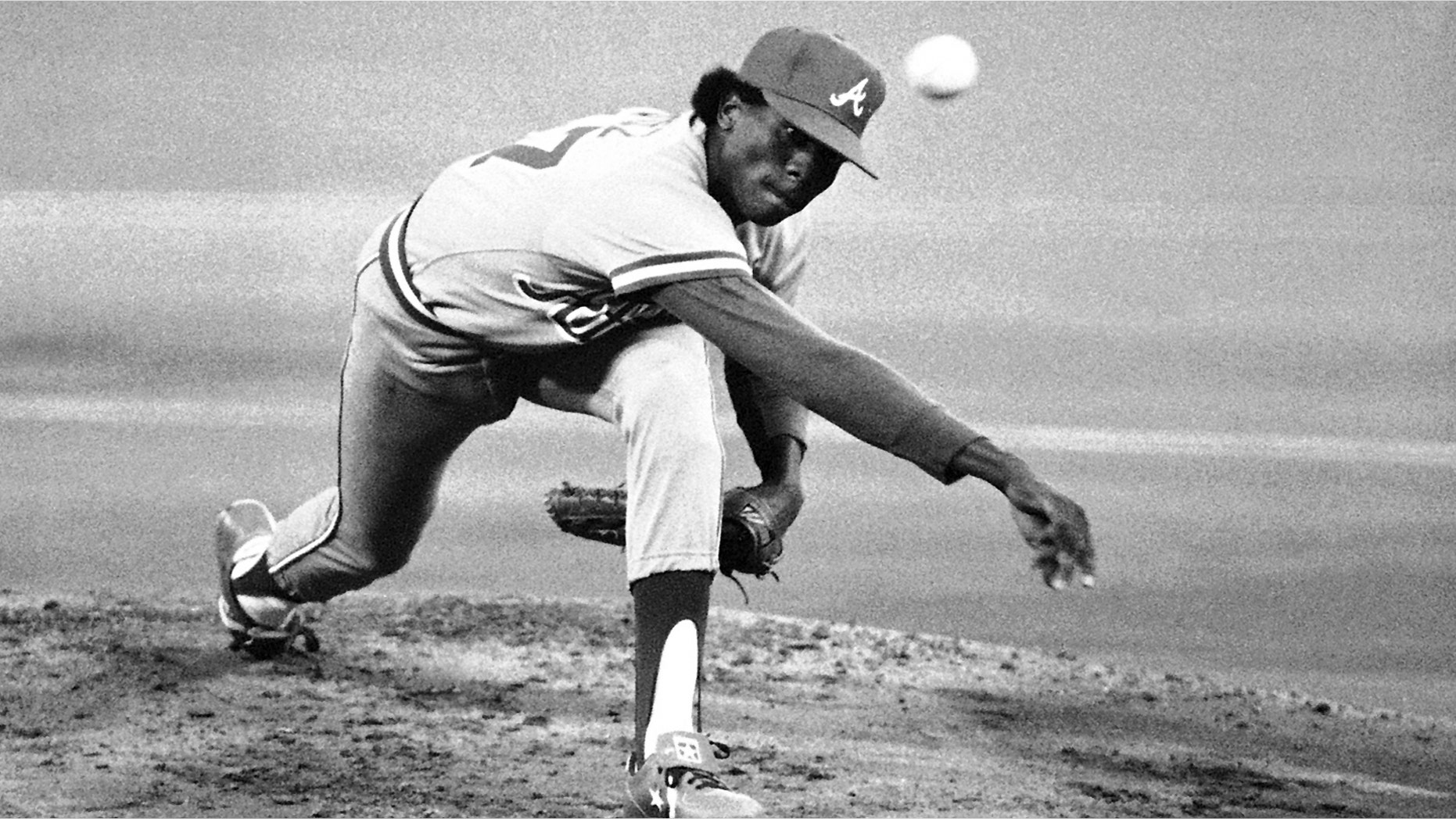 FILE - In this May, 8, 1984, file photo, Atlanta Braves' Pascual Perez delivers a pitch on his way to earning a victory against the Philadelphia Phillies during a baseball game in Philadelphia. Police in the Dominican Republic say the former major league pitcher has been killed in his home during an apparent robbery. (AP Photo/Amy Sancetta, File)