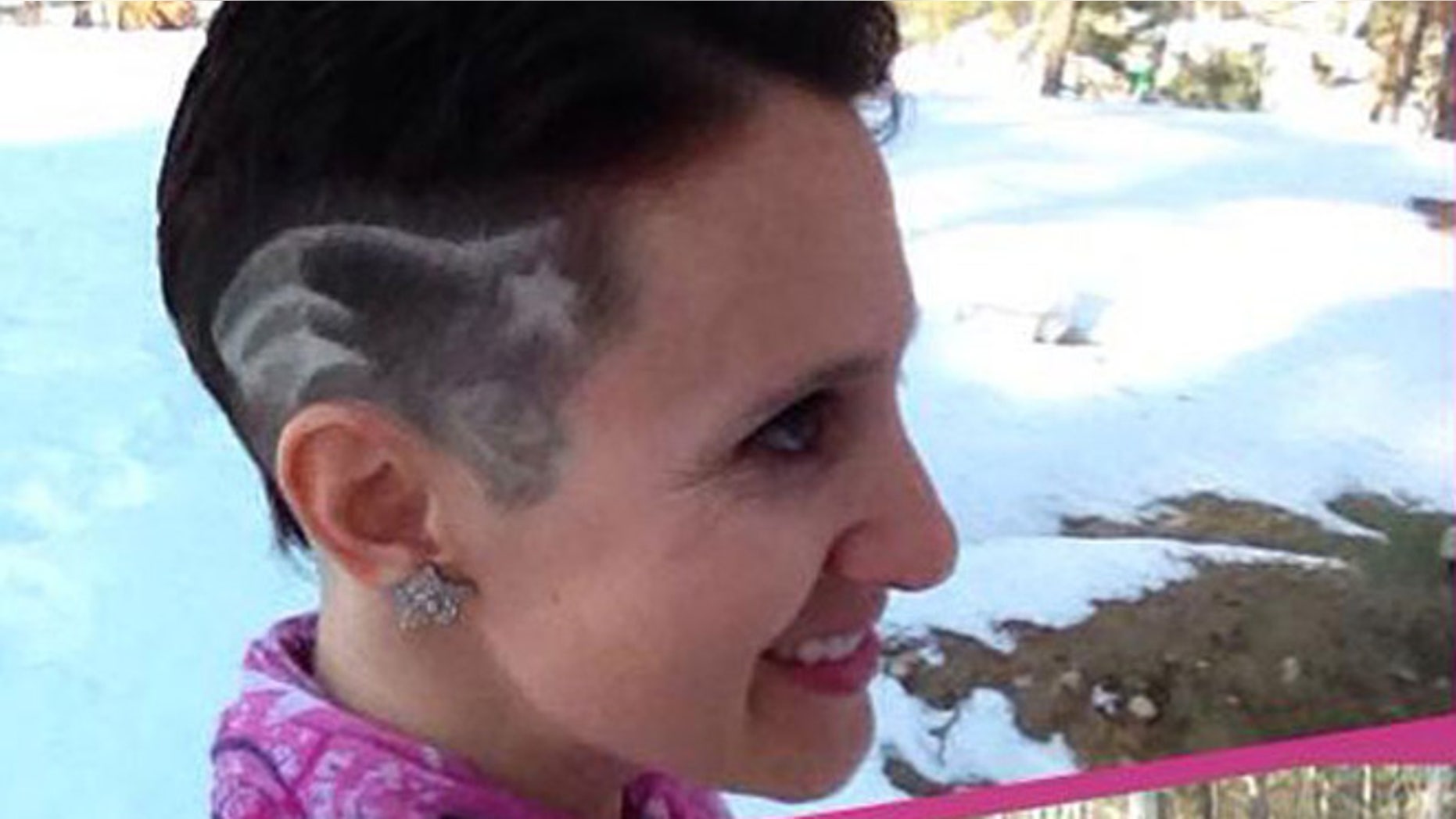 Paula McDonald, who is fighting breast cancer, said she hopes her move to have the Patriots logo shaved on the side of her head helps her team and raises awareness to perform self-examinations.