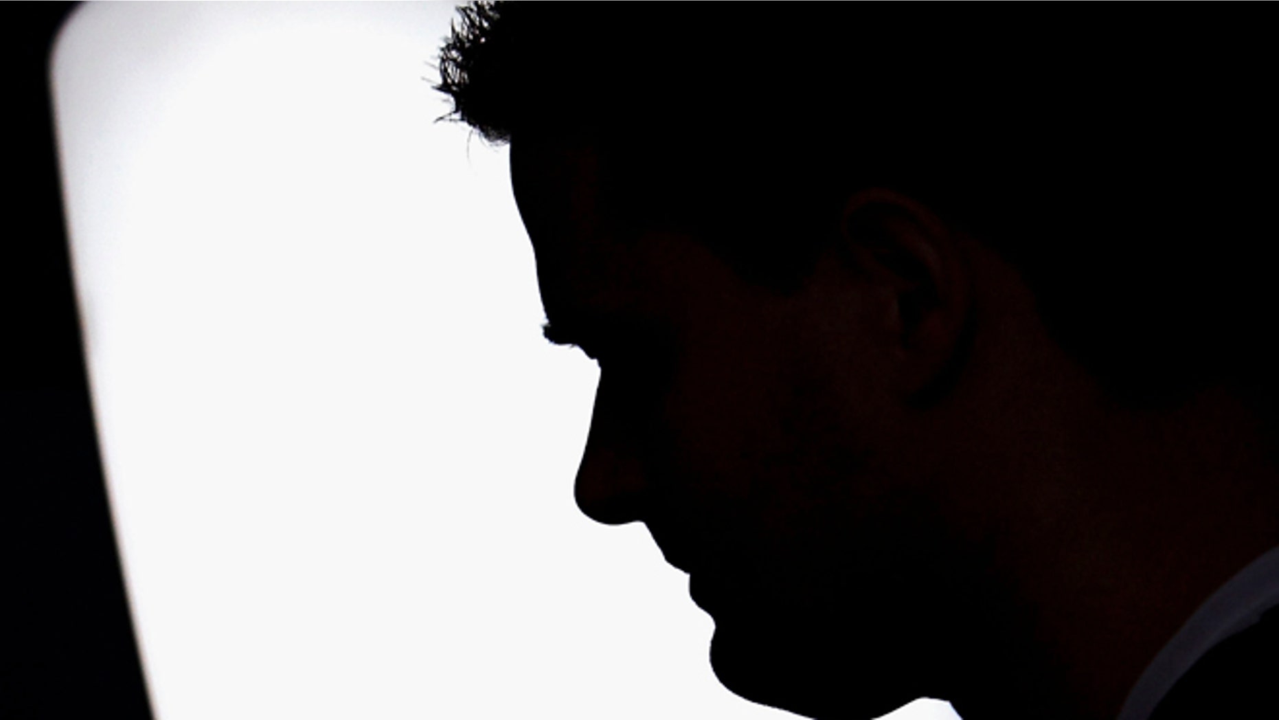 GLASGOW, UNITED KINGDOM - OCTOBER 12: A man suffering from Seasonal Affective Disorder uses a light box in his office to combat the illness on October 12 2005 in Glasgow, Scotland. Seasonal affective disorder (SAD), or winter depression, is a mood disorder related to the change in the seasons and the resulting reduction of exposure to daylight. The end of British Summer time, when clocks go back one hour at the end of October, will see most people making their daily commute in darkness both ways. With winter nights stretching to 19 hours in the UK, and Scotland's often inclement weather, it is estimated that the "Winter Blues" can affect up to 20% of the population. (Photo by Christopher Furlong/Getty Images)