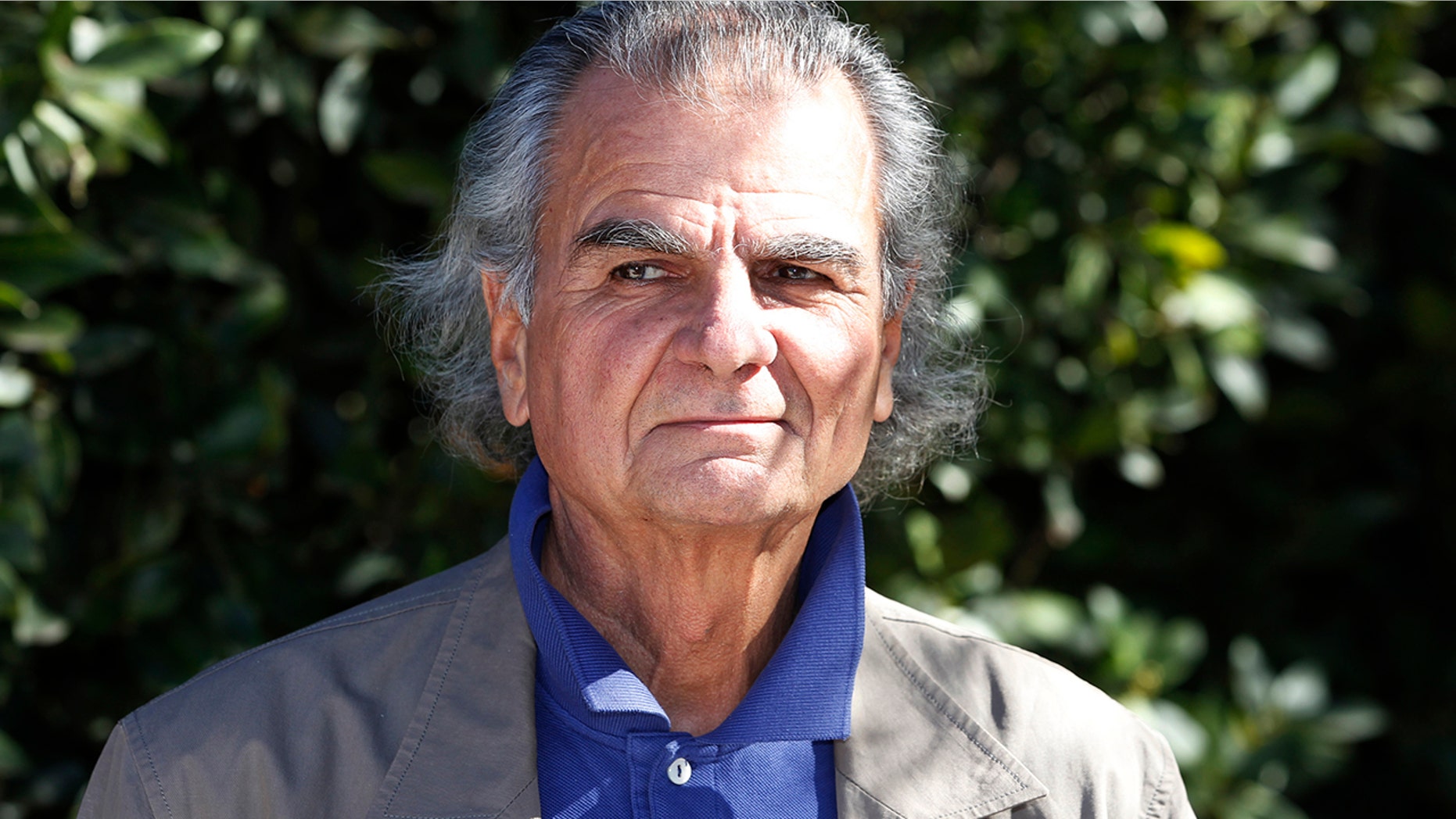 French fashion photographer Patrick Demarchelier poses at the first annual UNICEF Women of Compassion Luncheon in Los Angeles, California February 11, 2011.