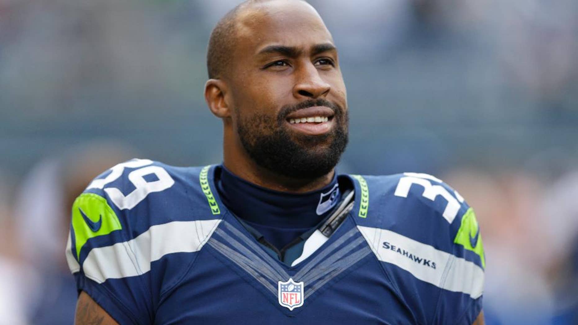 FILE - In this Sept. 22, 2013, file photo, Seattle Seahawks' Brandon Browner stands before an NFL football game against the Jacksonville Jaguars in Seattle. Former Seahawks cornerback Browner has signed with the New England Patriots. (AP Photo/Ted S. Warren, File)