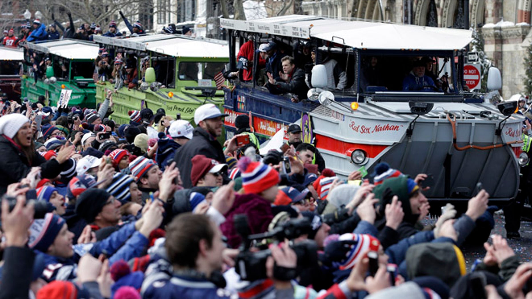 Feb. 4, 2015: New England Patriots fans cheer as the team passes by in a procession of duck boats during a parade in Boston to honor the Patriots' victory over the Seattle Seahawks in Super Bowl XLIX Sunday in Glendale, Ariz. (AP)