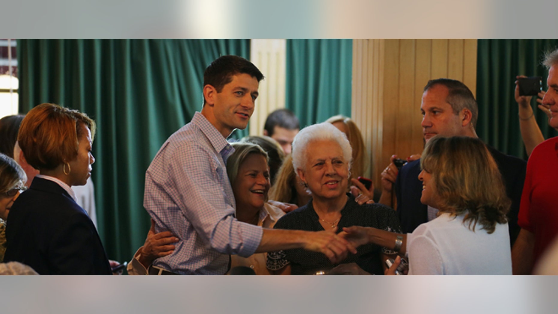 MIAMI, FL - SEPTEMBER 22: Republican vice presidential candidate, U.S. Rep. Paul Ryan (R-WI) greets people during a campaign stop at Versailles restaurant in the Little Havana neighborhood on September 22, 2012 in Miami, Florida. Ryan continues to campaign for votes across the country. (Photo by Joe Raedle/Getty Images)