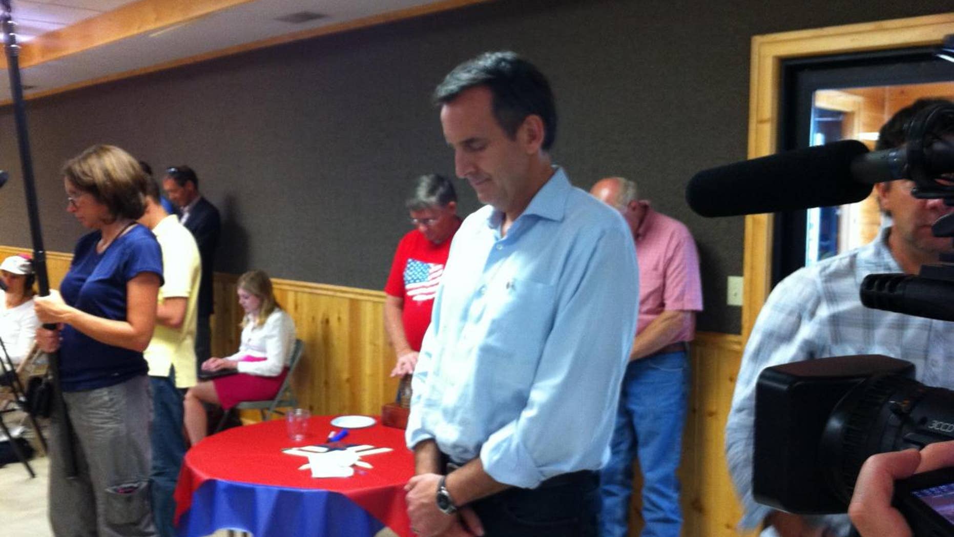 Former Minnesota Governor Tim Pawlenty stands during a prayer at a Humboldt County GOP meeting August 9. (Fox News)