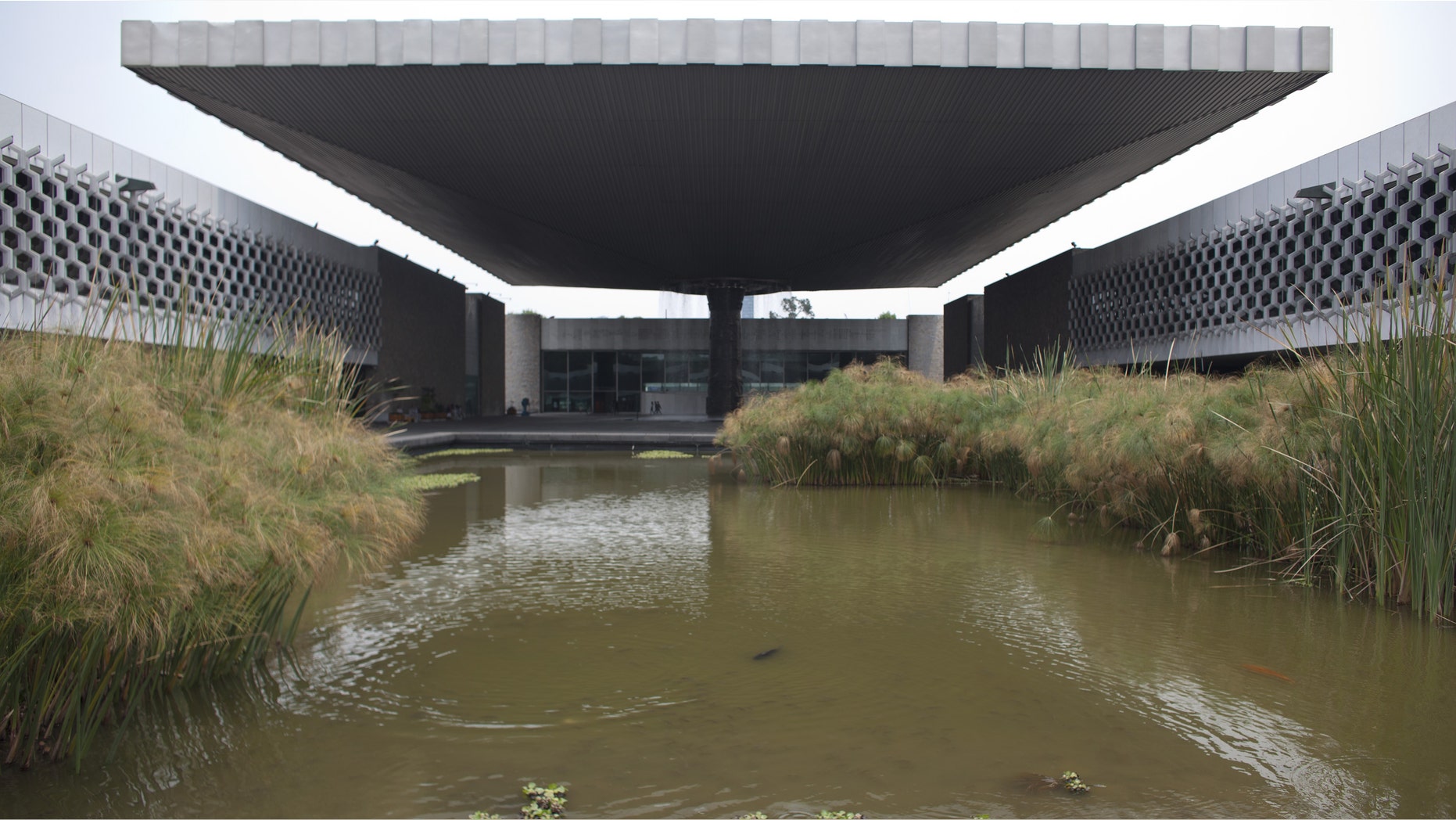 A view of the Anthropology Museum, designed by Mexican architect Pedro Ramirez Vazquez, in Mexico City, Wednesday, April 17, 2013. Vazquez also designed some of Mexico's biggest landmark modernist structures, including the new Basilica of Guadalupe and the Azteca Stadium. Ramirez Vazquez died late Tuesday of pneumonia, at the age of 94. (AP Photo/Alexandre Meneghini)