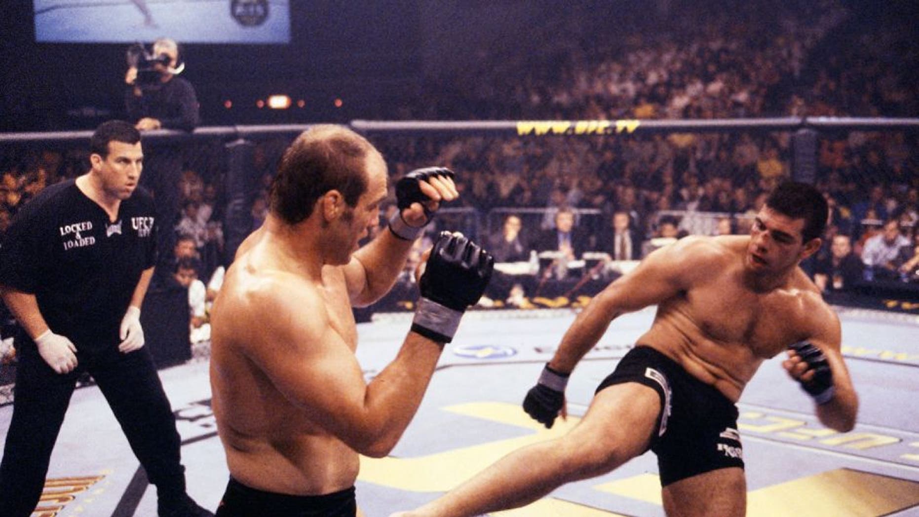 ATLANTIC CITY, NJ - MAY 04: (R-L) Pedro Rizzo kicks Randy Couture at UFC 31 on May 4, 2001 in Atlantic City, New Jersey. (Photo by Susumu Nagao/Zuffa LLC/Zuffa LLC via Getty Images)