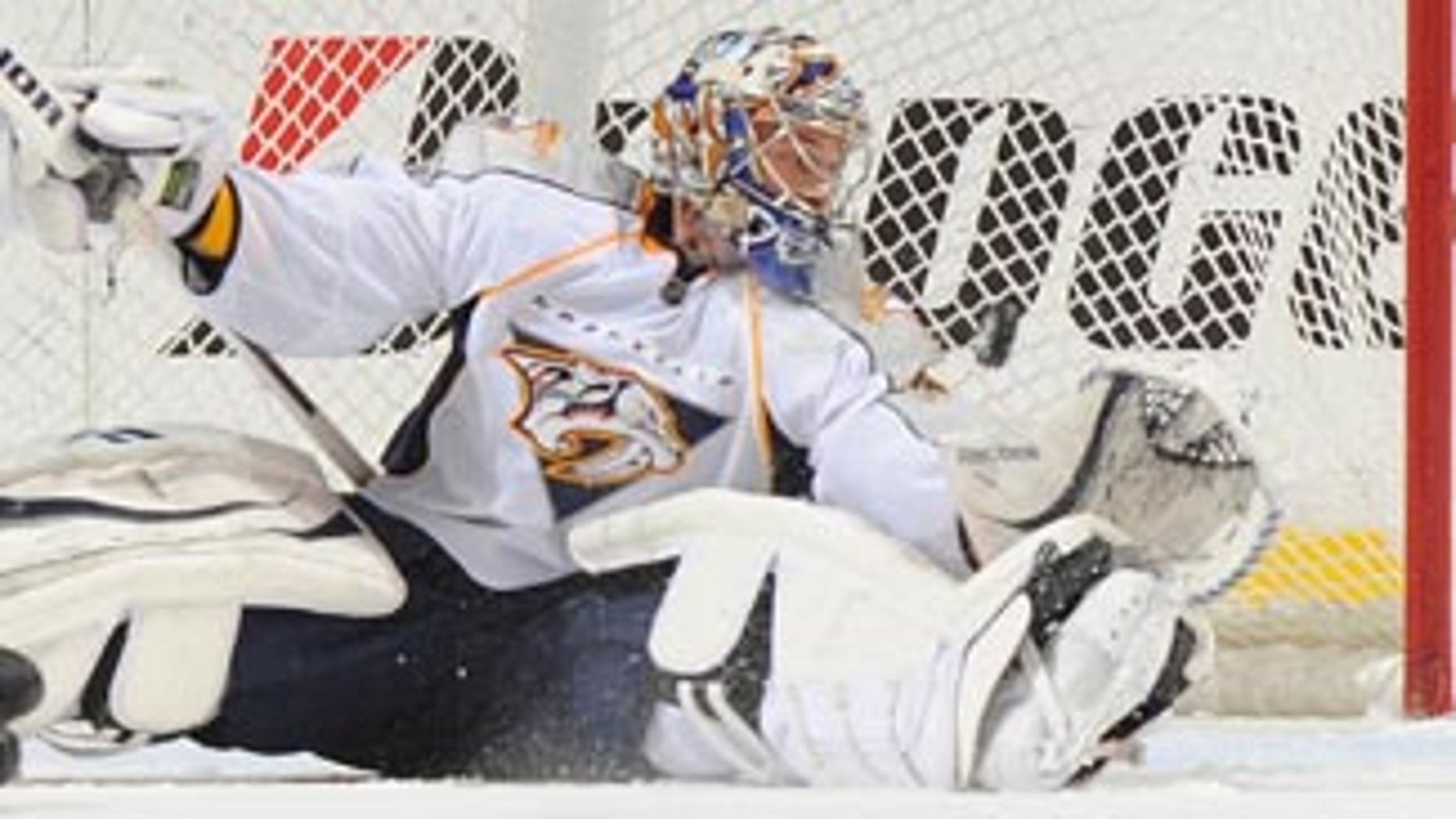 NASHVILLE, TN - MARCH 16: Pekka Rinne #35 of the Nashville Predators blocks the shot of Danny Briere #48 of the Philadelphia Flyers on March 16, 2010 at the Bridgestone Arena in Nashville, Tennessee. (Photo by John Russell/NHLI via Getty Images) *** Local Caption *** Pekka Rinne;Danny Briere