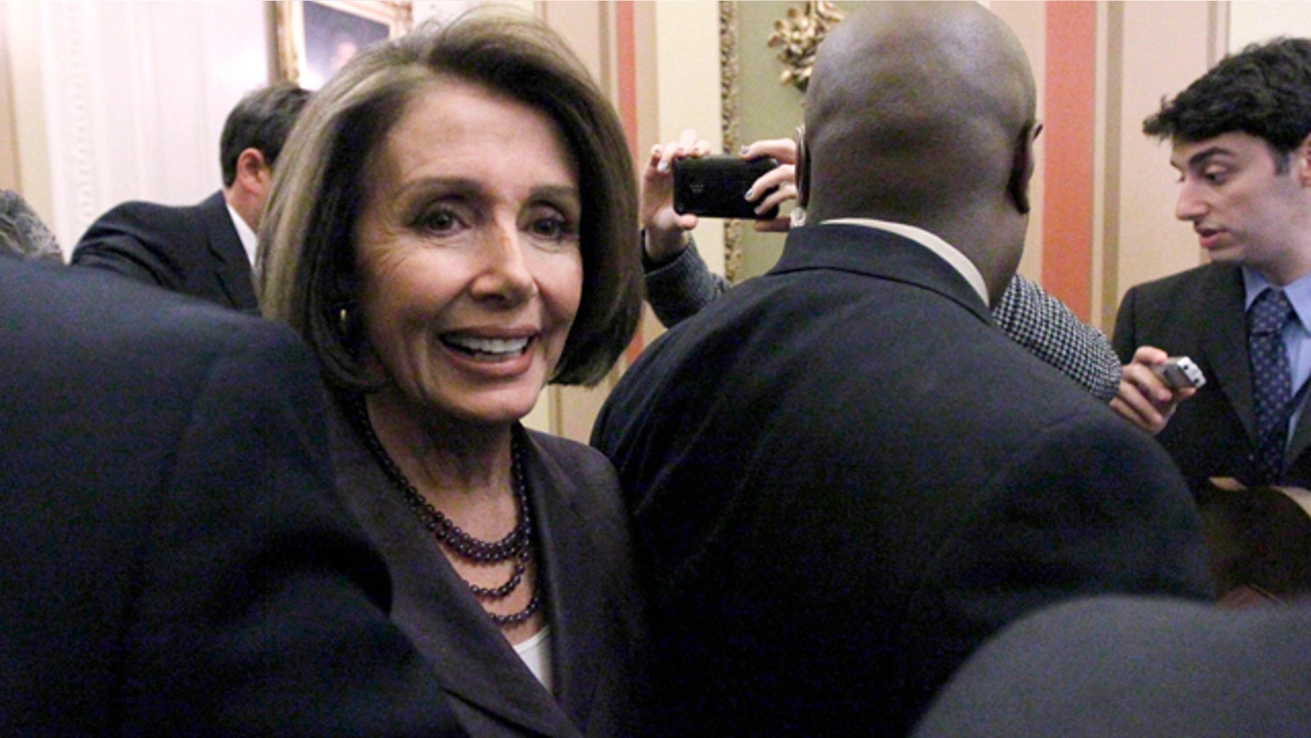 Nov. 3, 2010: House Speaker Nancy Pelosi of Calif. prepares for a TV interview on Capitol Hill in Washington.