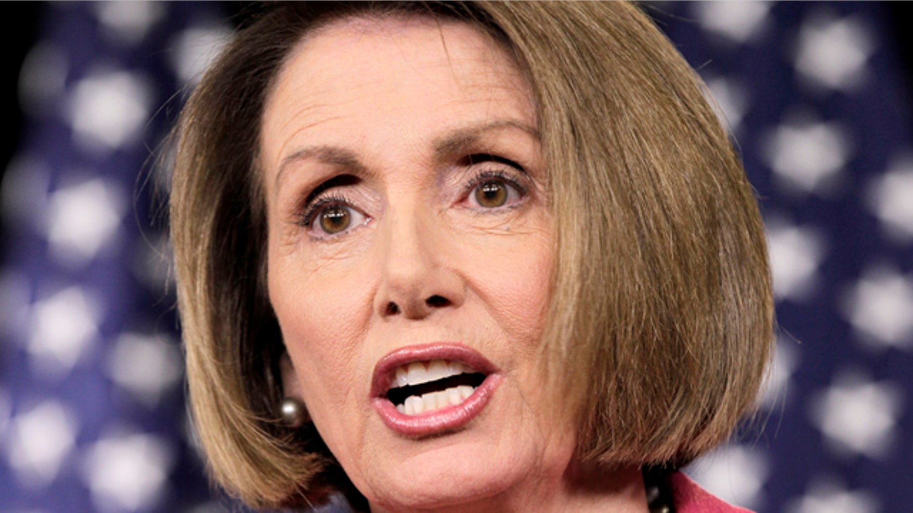 June 23: Rep. Nancy Pelosi reportedly attends U2 concert while President Obama unveils troop drawback plan.