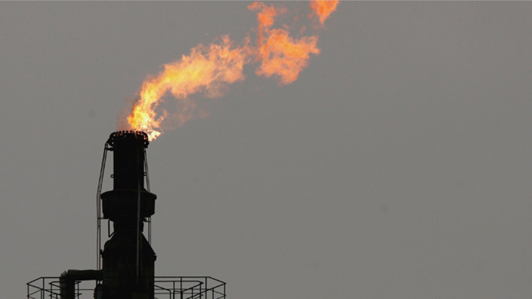 SCHWEDT, GERMANY - JANUARY 09: An exhaust flame burns at the PCK crude oil refinery January 9, 2007 near the Polish border in Schwedt, Germany. Crude oil from Russia has stopped flowing to the PCK refinery since 6:00 AM January 8 due to a row between Russia and Belarus over how much Belarus should pay for Russian oil. Initial reports claimed Belarus had turned off the flow of crude oil through the "Druzhba" pipeline as a means to negotiate a better price. German oil reserves are still substantial, though Chancellor Angela Merkel announced her country must not depend too much on one source for its energy needs. (Photo by Sean Gallup/Getty Images)