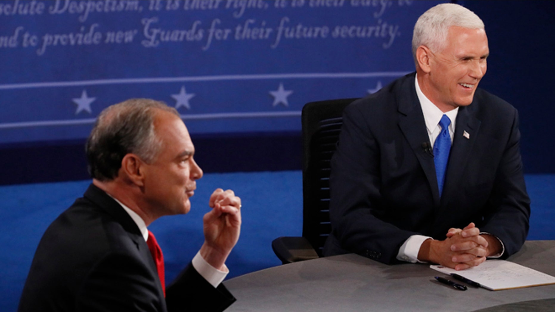 Republican vice-presidential nominee Gov. Mike Pence, right, and Democratic vice-presidential nominee Sen. Tim Kaine debate during the vice-presidential debate at Longwood University in Farmville, Va., Tuesday, Oct. 4, 2016. (Andrew Gombert/Pool via AP)