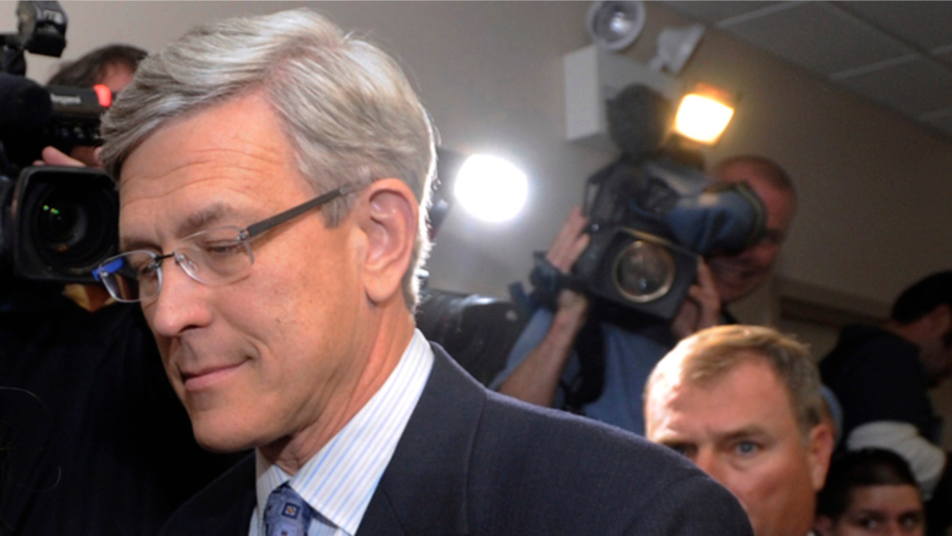 Nov. 7, 2011: This file photo shows former Penn State athletic director Tim Curley, left, and former Penn State Vice President Gary Schultz, right, entering a district judge's office for an arraignment in Harrisburg, Pa.