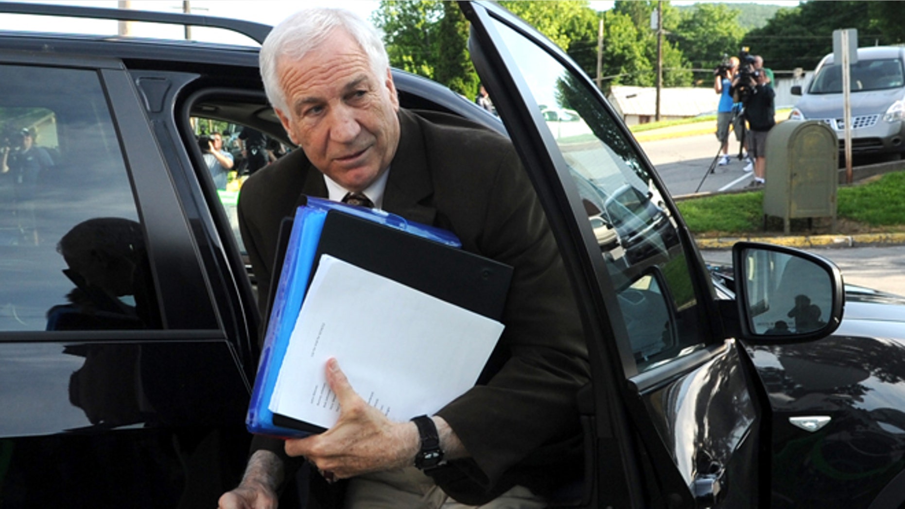 June 14: Former Penn State University assistant football coach Jerry Sandusky arrives for the fourth day of his trial at the Centre County Courthouse in Bellefonte, Pa.