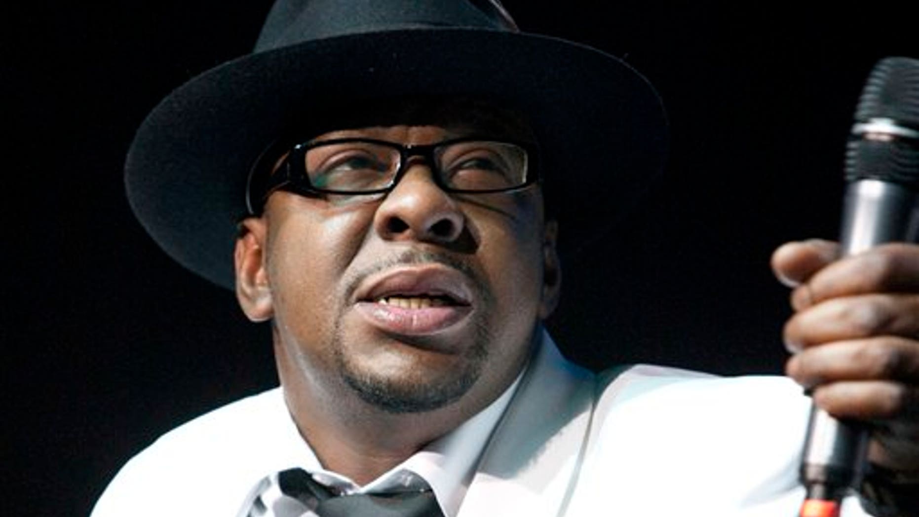 In this Feb. 18, 2012 file photo, singer Bobby Brown, former husband of the late Whitney Houston performs with New Edition at Mohegan Sun Casino in Uncasville, Conn.