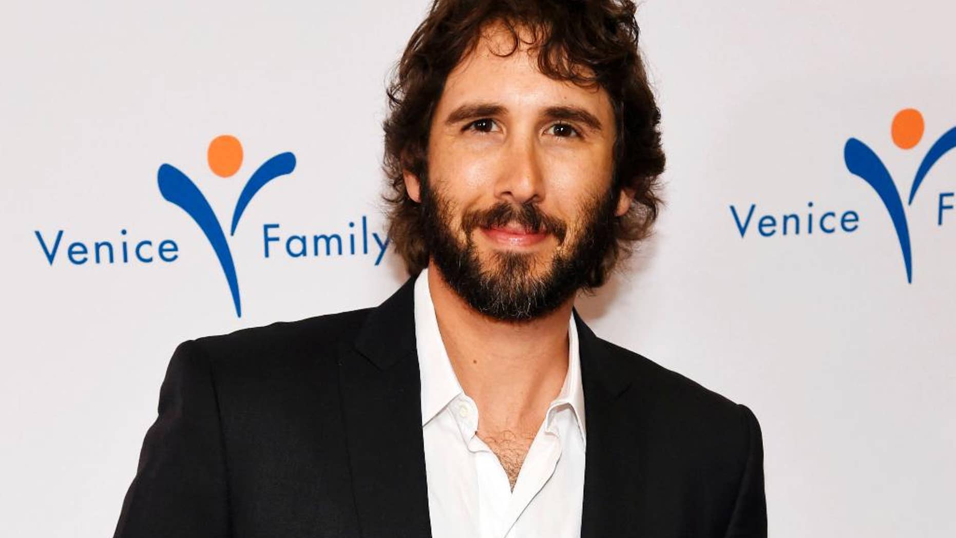 FILE - In this March 9, 2015, file photo, singer Josh Groban attends the 2015 Silver Circle Gala in Beverly Hills, Calif. Groban has been selected to sing the national anthem at the annual Kentucky Derby, to be held May 2, 2015, at the Churchill Downs racetrack in Louisville, Ky. (Photo by Chris Pizzello/Invision/AP, File)