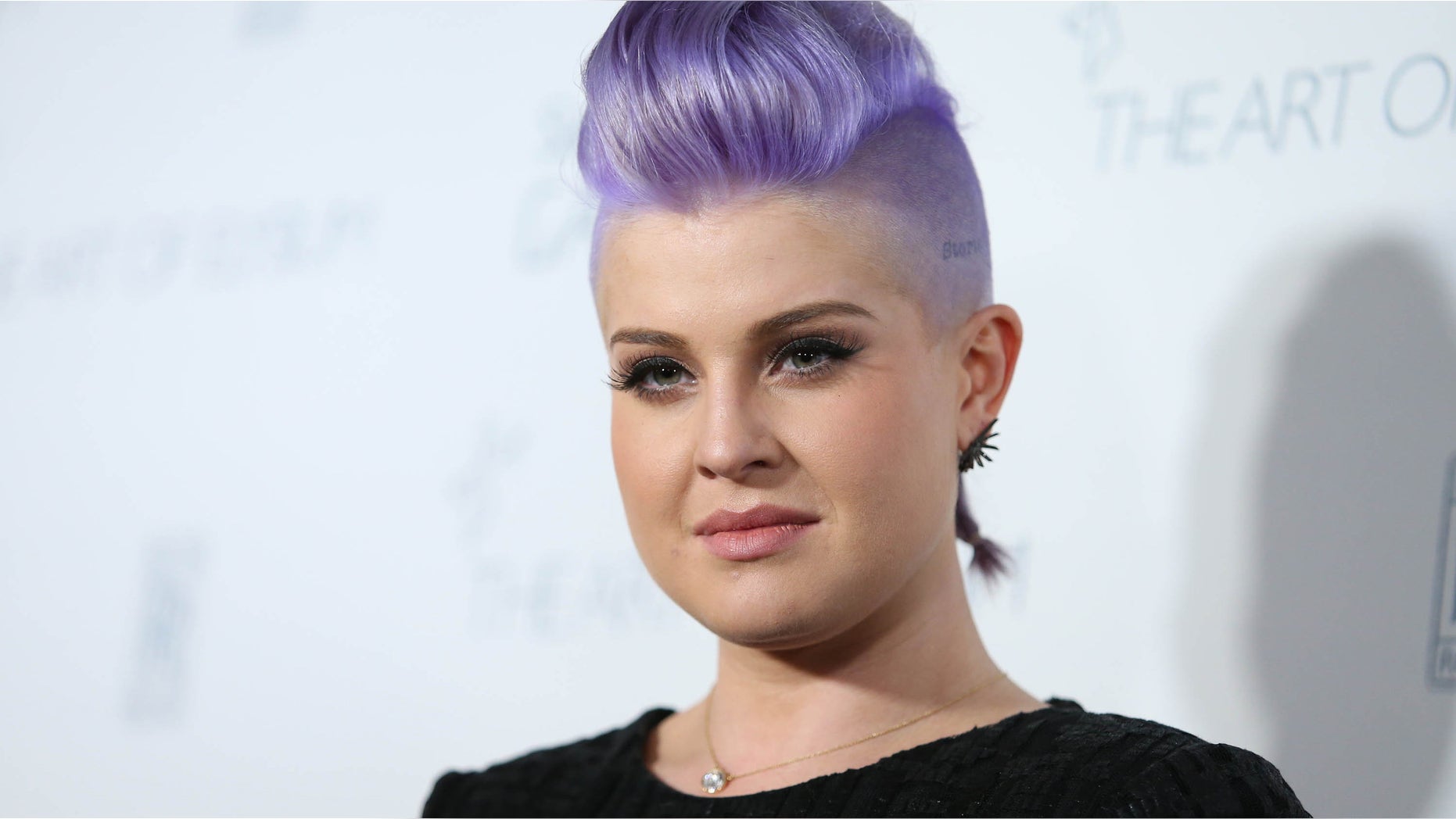 FILE - In this Jan. 10, 2015 file photo, Kelly Osbourne arrives at The Art of Elysium Heaven Gala at Hangar 8 in Santa Monica, Calif. Osbourne apologized Tuesday, Aug. 4, 2015, for comments she made earlier in the day on "The View" about Latinos cleaning Donald Trump's toilets. (Photo by Omar Vega/Invision/AP, File)