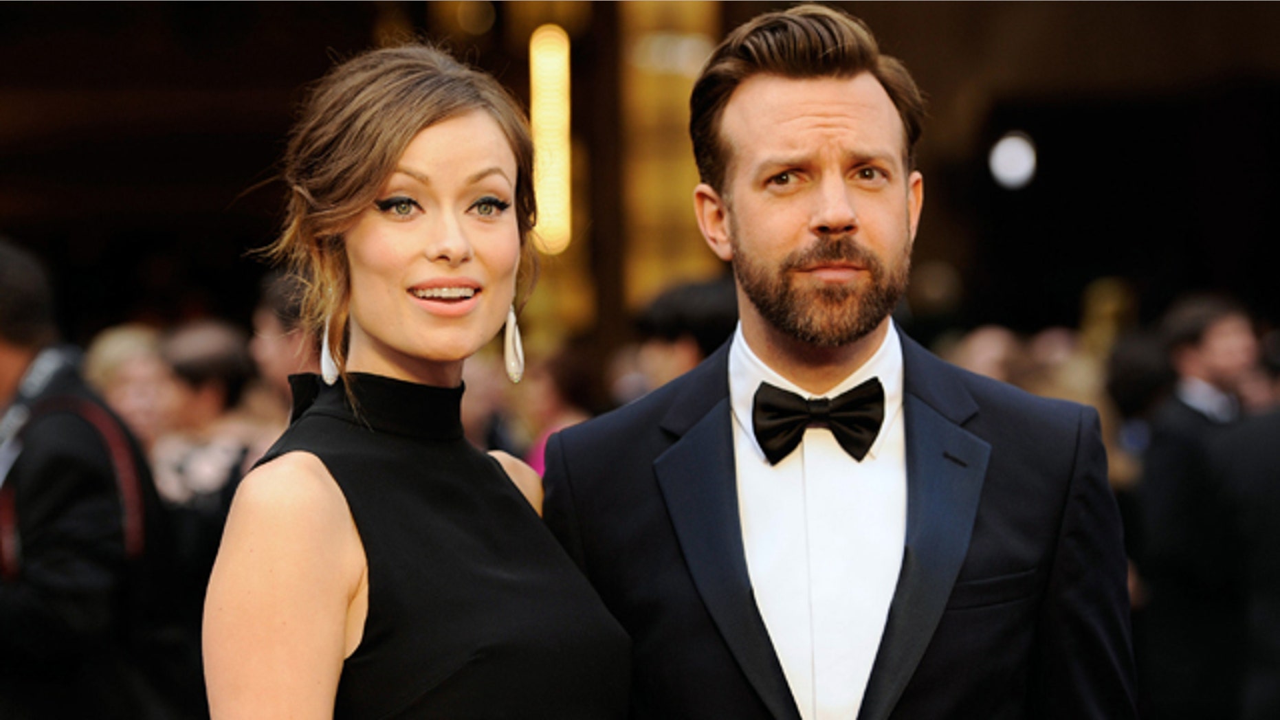 FILE - In this Sunday, March 2, 2014 file photo, Olivia Wilde, and Jason Sudeikis arrive at the Oscars at the Dolby Theatre in Los Angeles. (Photo by Chris Pizzello/Invision/AP, file)