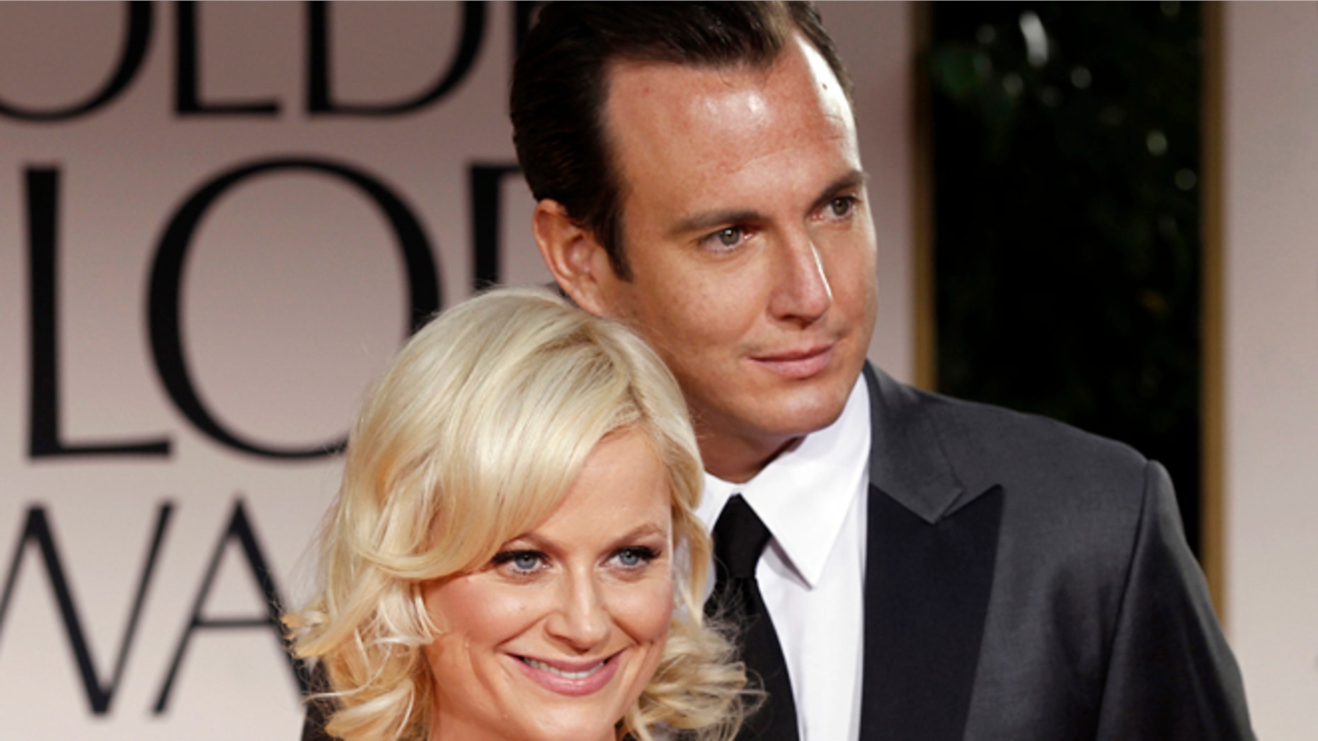 Jan. 15, 2012: Actors Amy Poehler, left, and Will Arnett arrive at the 69th Annual Golden Globe Awards in L.A.