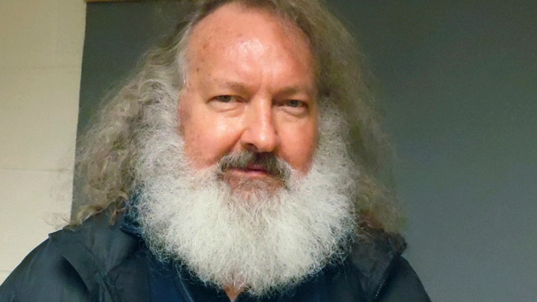 In this Oct. 9, 2015 file photo provided by the Vermont State Police, actor Randy Quaid stands in the Vermont State Police barracks in St. Albans, Vt.