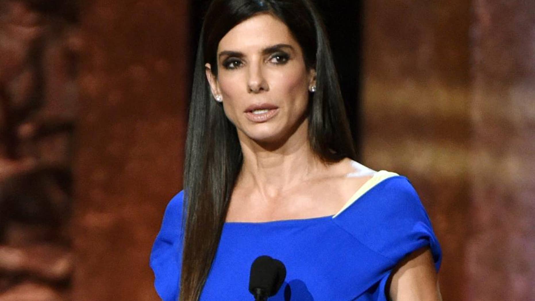 FILE - In this June 5, 2014 file photo, Sandra Bullock speaks at the 42nd AFI Lifetime Achievement Award Tribute Gala in Los Angeles. A preliminary hearing for a man accused of breaking into Sandra Bullock’s home has begun with the recording of a 911 call of the panicked actress reporting the man was in her home. Bullock is heard telling police that she is hiding in the closet of her Los Angeles home after seeing the man inside her home. The recording was played in court Thursday, April 9, 2015. (Photo by John ShearerInvision/AP, File)
