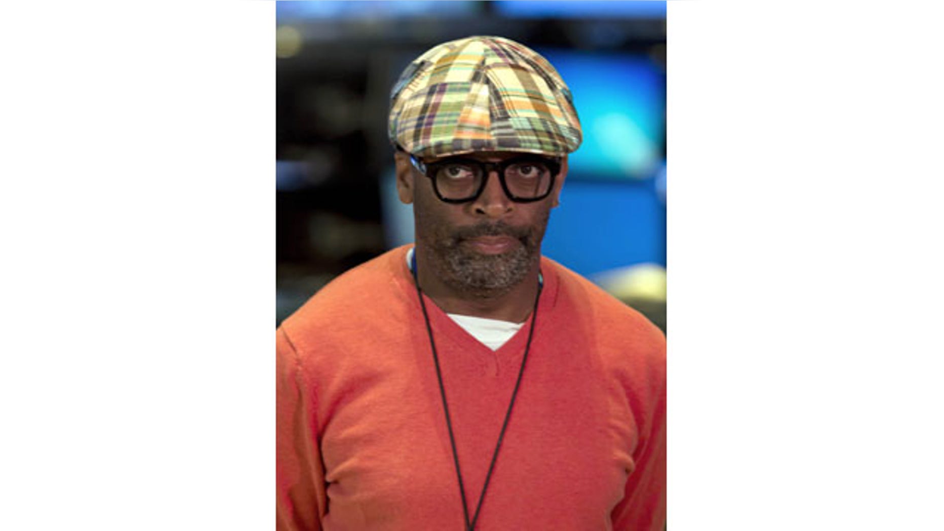 File-This July 31, 2013, file photo shows filmmaker Spike Lee being interviewed on the floor of the New York Stock Exchange. Lee has engaged in a brief and lively profanity-laced debate about gentrification of largely black New York City neighborhoods. (AP)