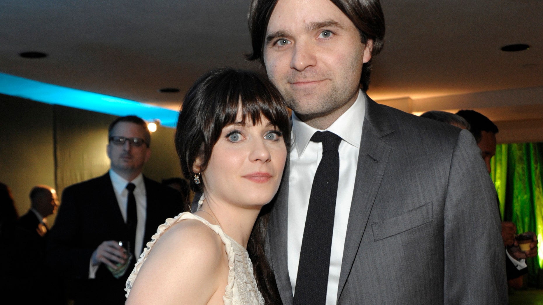 Jan. 16, 2011: File photo, actress Zooey Deschanel, left, and her husband, singer Ben Gibbard attend the 2011 HBO Golden Globe Party in Beverly Hills, Calif. Court records show a Los Angeles judge finalized the former couple's divorce on Dec. 12, 2012. The pair were married in 2009 and separated in October 2011.