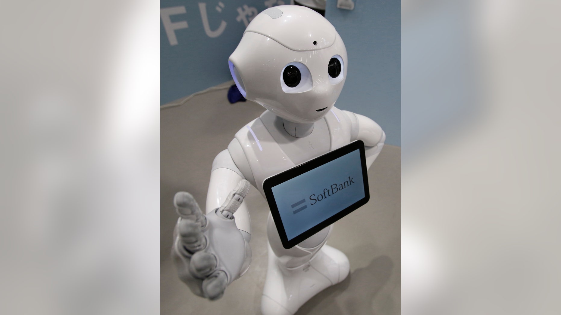 File photo - SoftBank Corp's human-like robot named 'pepper' is displayed at its branch in Tokyo June 6, 2014.