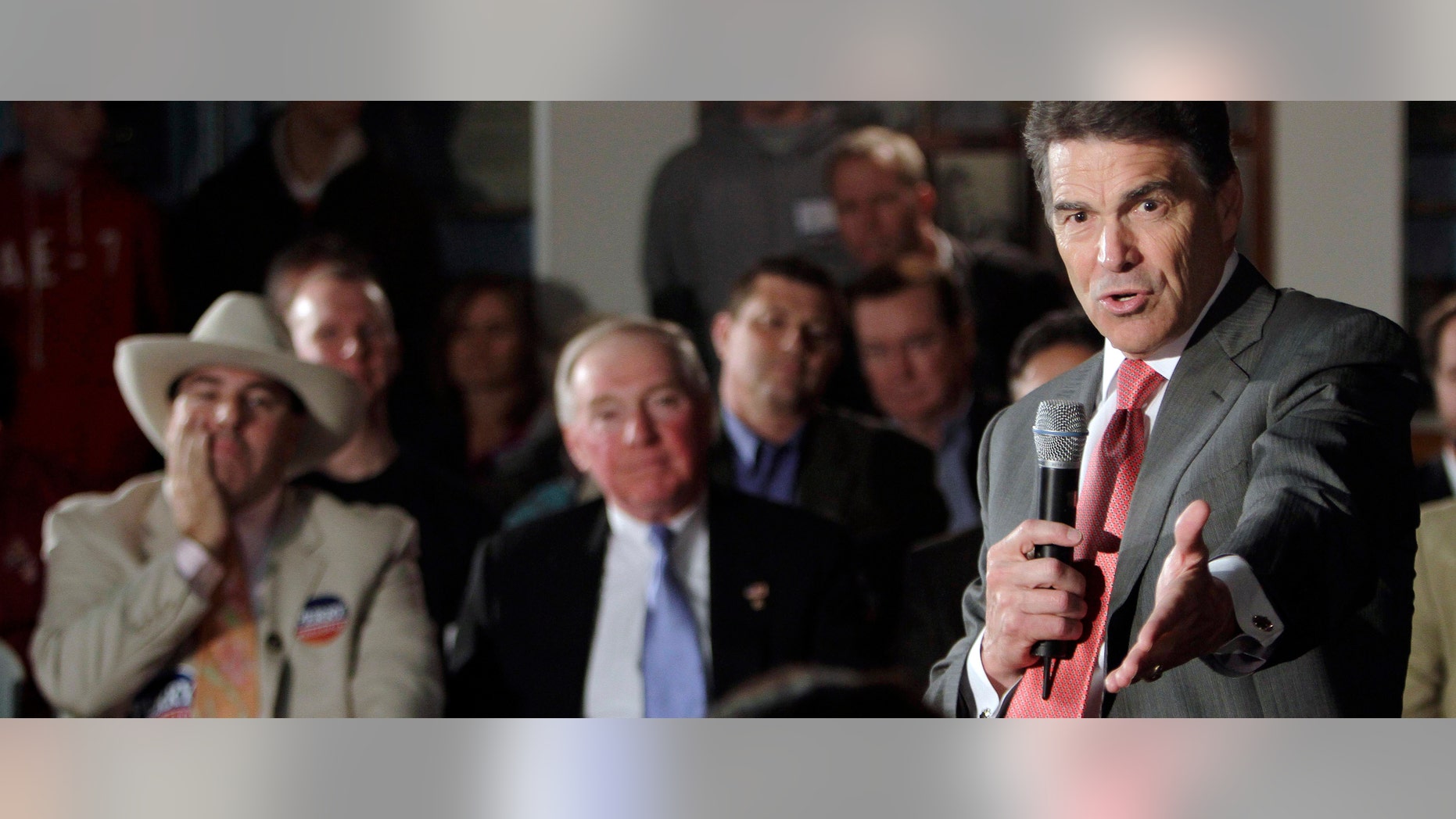 Republican presidential candidate, Texas Gov. Rick Perry speaks during a campaign stop at a VFW post, Wednesday, Nov. 16, 2011, in Nashua, N.H. (AP Photo/Jim Cole)