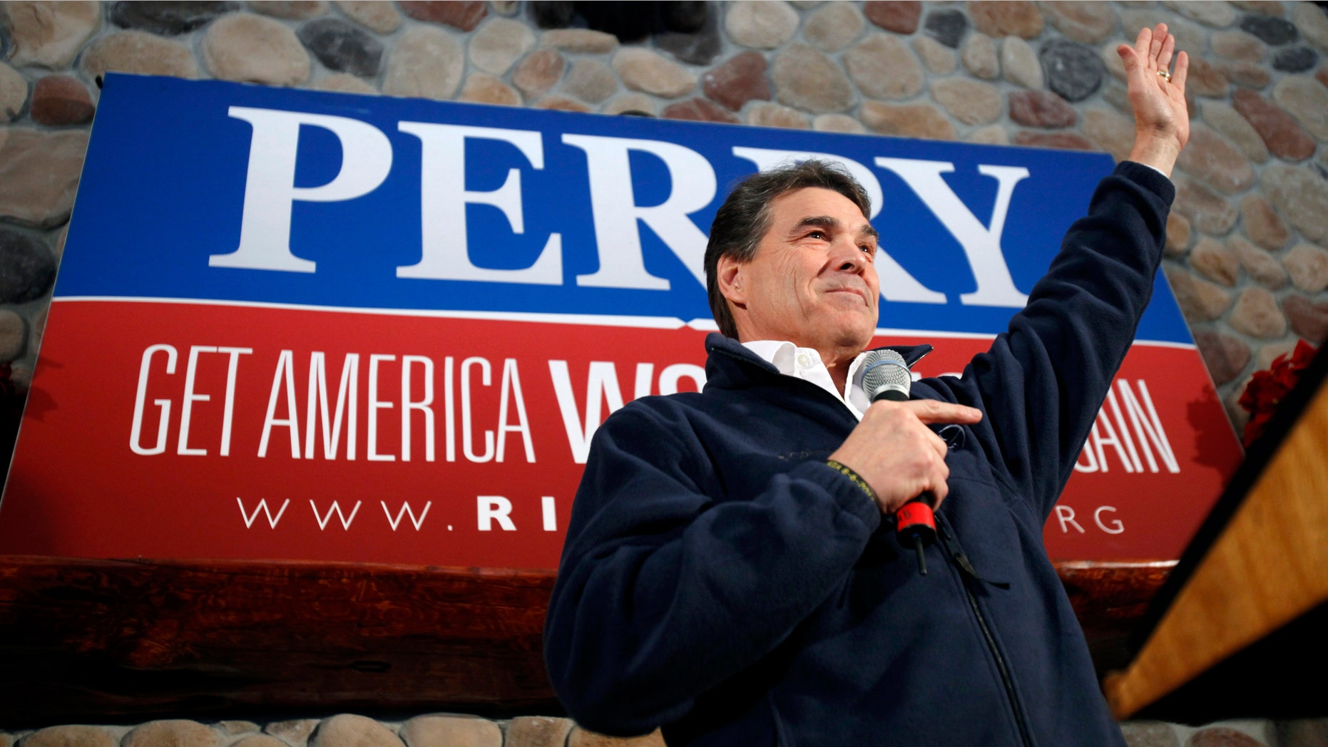 Republican presidential candidate, Texas Gov. Rick Perry speaks during a campaign stop at the Stoney Creek Inn, Monday, Jan. 2, 2012, in Sioux City, Iowa. (AP Photo/Charlie Neibergall)