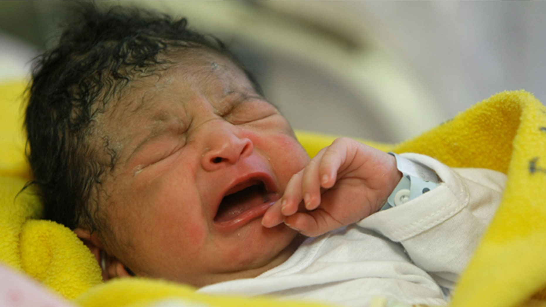 Oct. 31, 2011: Newborn girl Yazuri Tarmeno -- one of several people worldwide named the 7 billionth born on the planet -- cries after being born at the Maternity hospital in Lima, Peru.