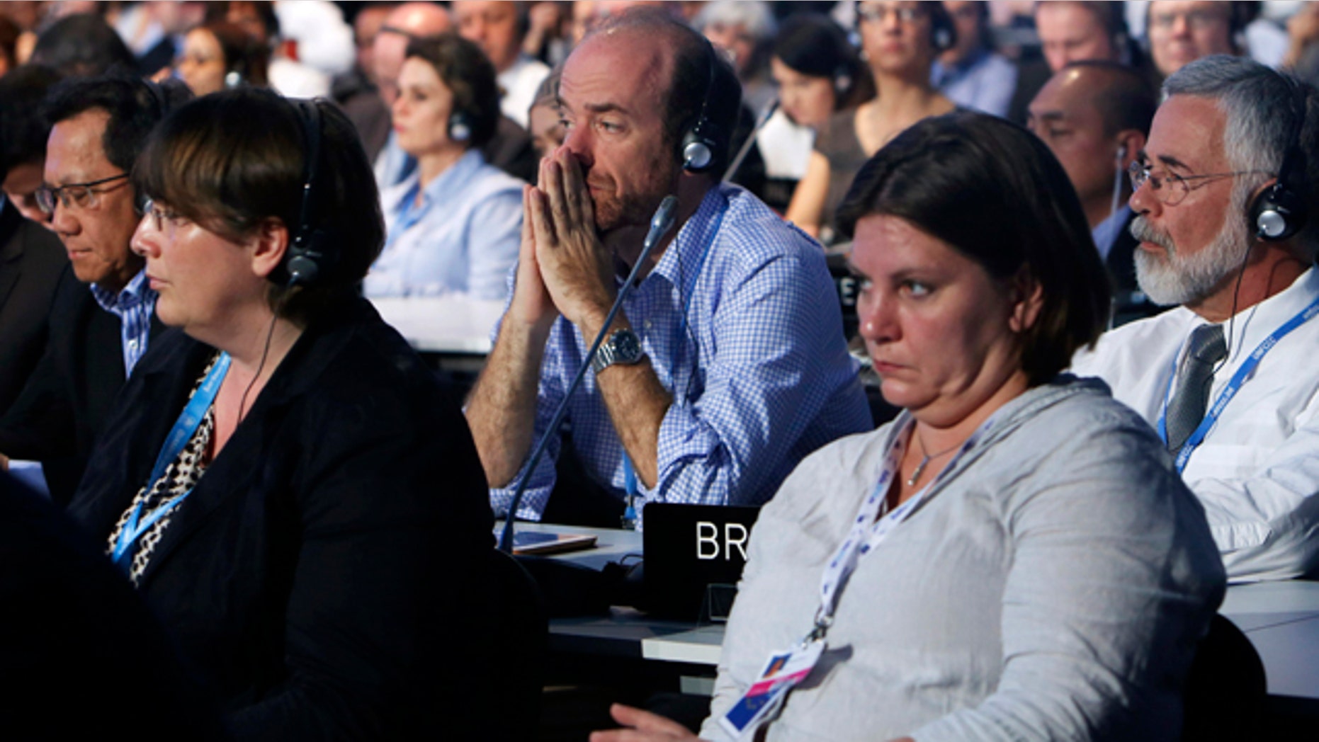 December 13, 2014: Delegates attend the U.N. Climate Change Conference in Lima, Peru. (AP Photo/Juan Karita)