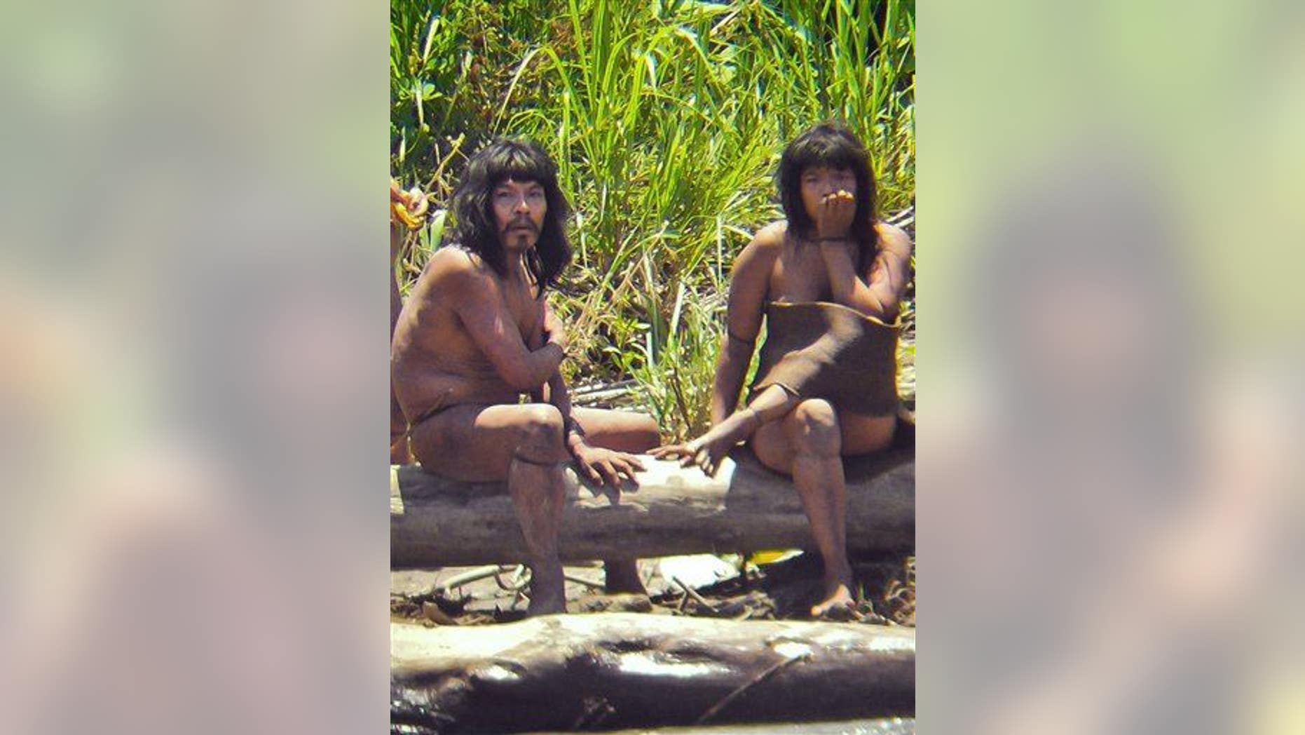 This 2011 photo shows members of the Mashco Piro tribe, photographed at an undisclosed location near the Manu National Park in southeastern Peru.