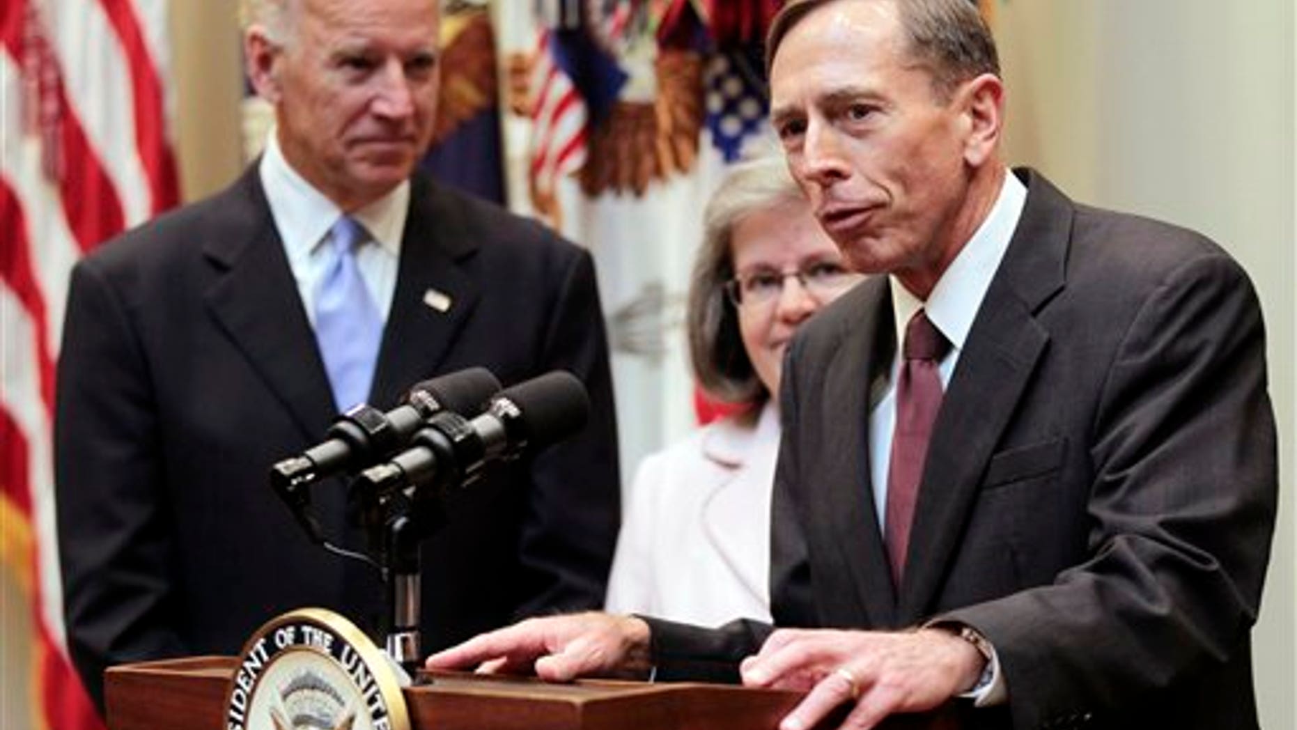 Sept. 6: CIA director David Petraeusspeaks following his swearing-in ceremony with his wife Holly Knowlton Petraeus and Vice President Joe Biden in the Roosevelt Room of the White House in Washington.
