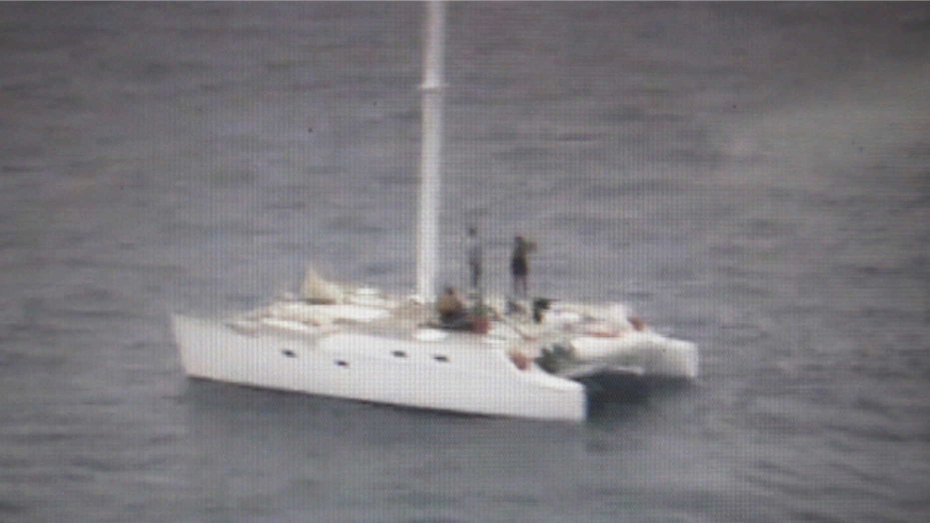 Jan. 23: American occupants are seen on board 38-foot catamaran The Pineapple as they wait to be rescued off the southern island of Dinagat, Philippines, in this image made from video and released by the Philippine coast guard.