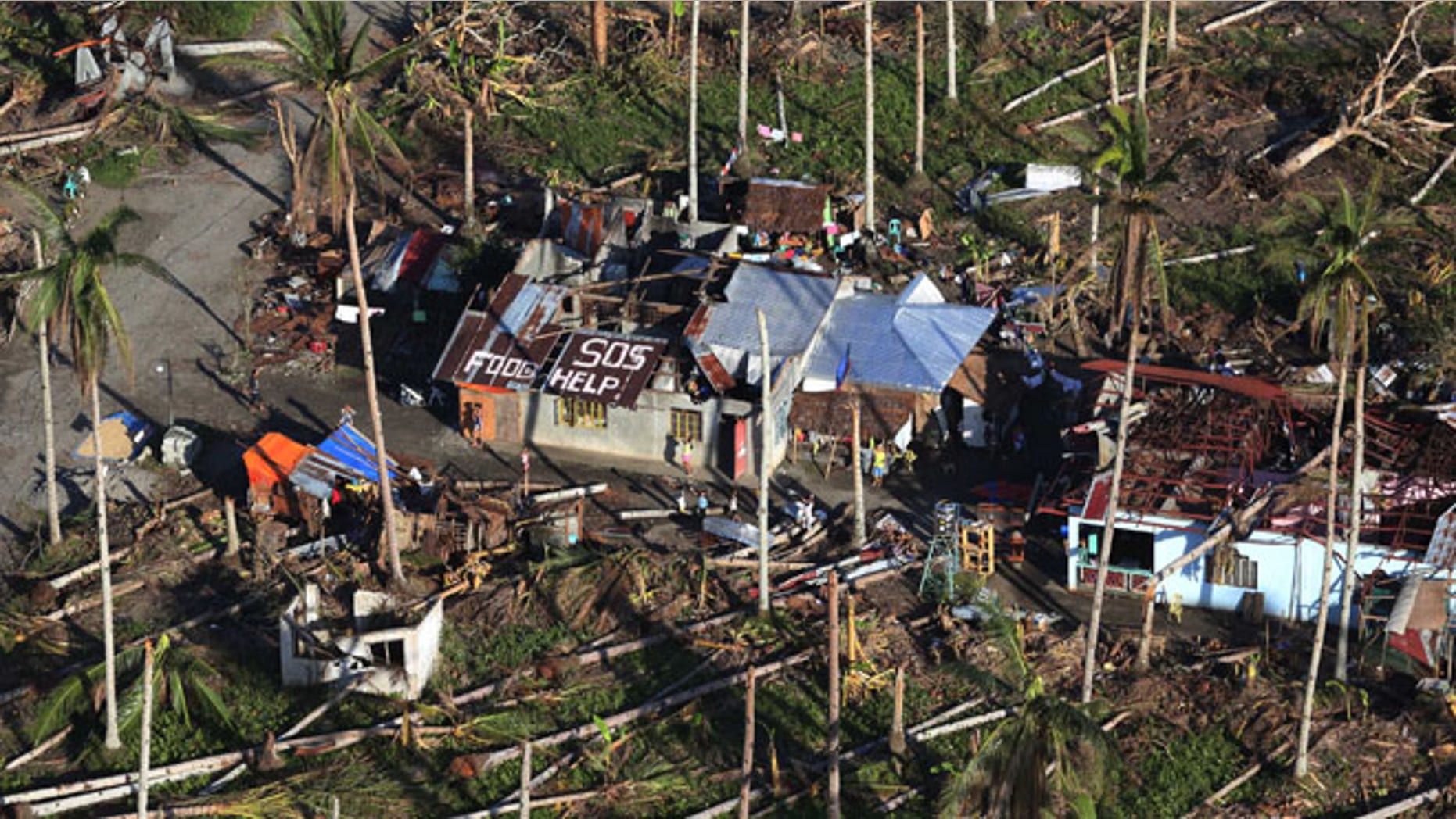 Aerial shot from a Philippine Air Force helicopter at typhoon-ravaged Leyte province, central Philippines, Monday, Nov. 18, 2013.