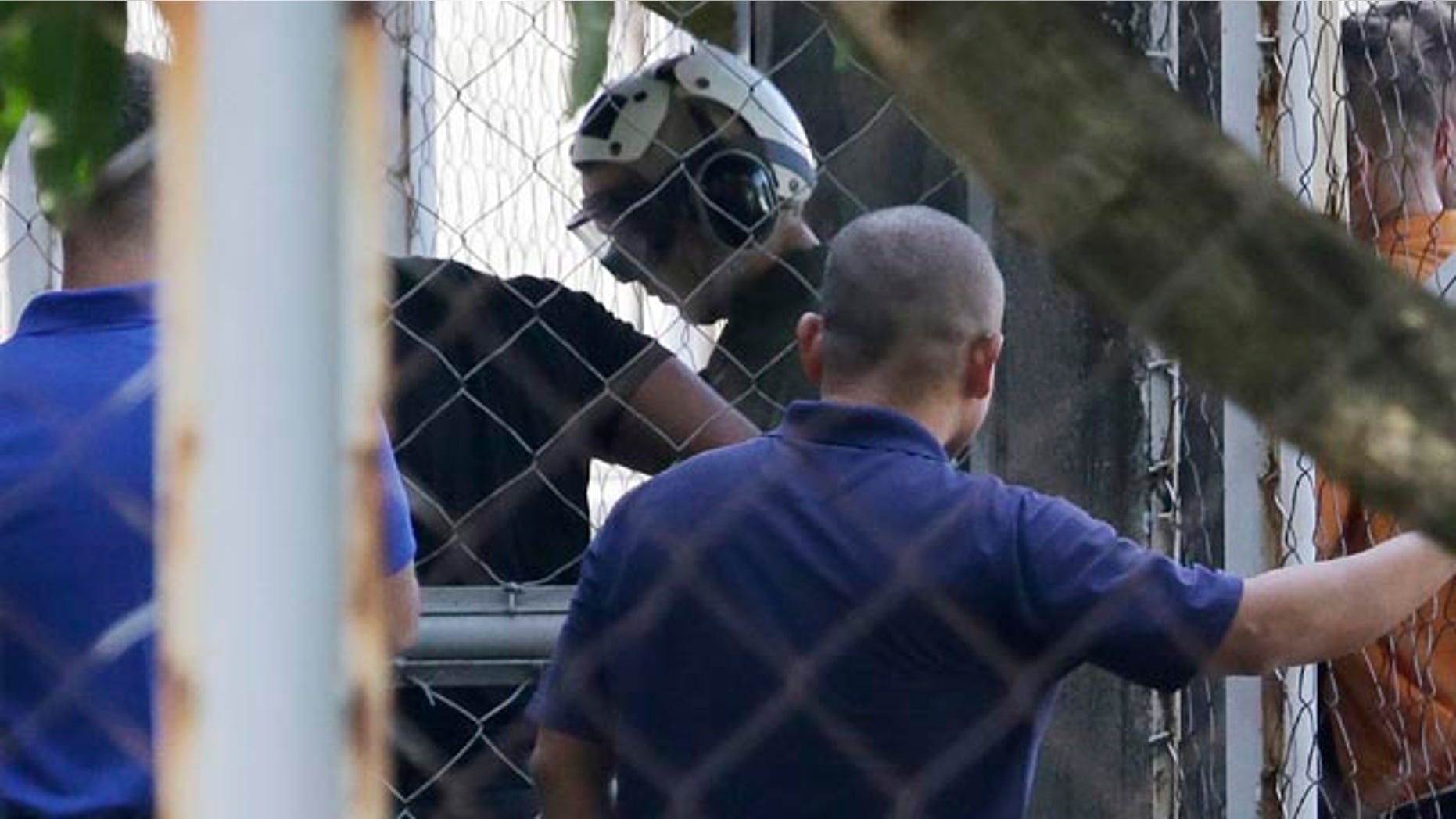 October 22, 2014: U.S. Marine Pfc. Joseph Scott Pemberton, a suspect in the gruesome killing of a transgender Filipino woman, arrives inside the compound of the Camp Aguinaldo military headquarters in suburban Quezon city, north of Manila, Philippines. (AP Photo/Aaron Favila)