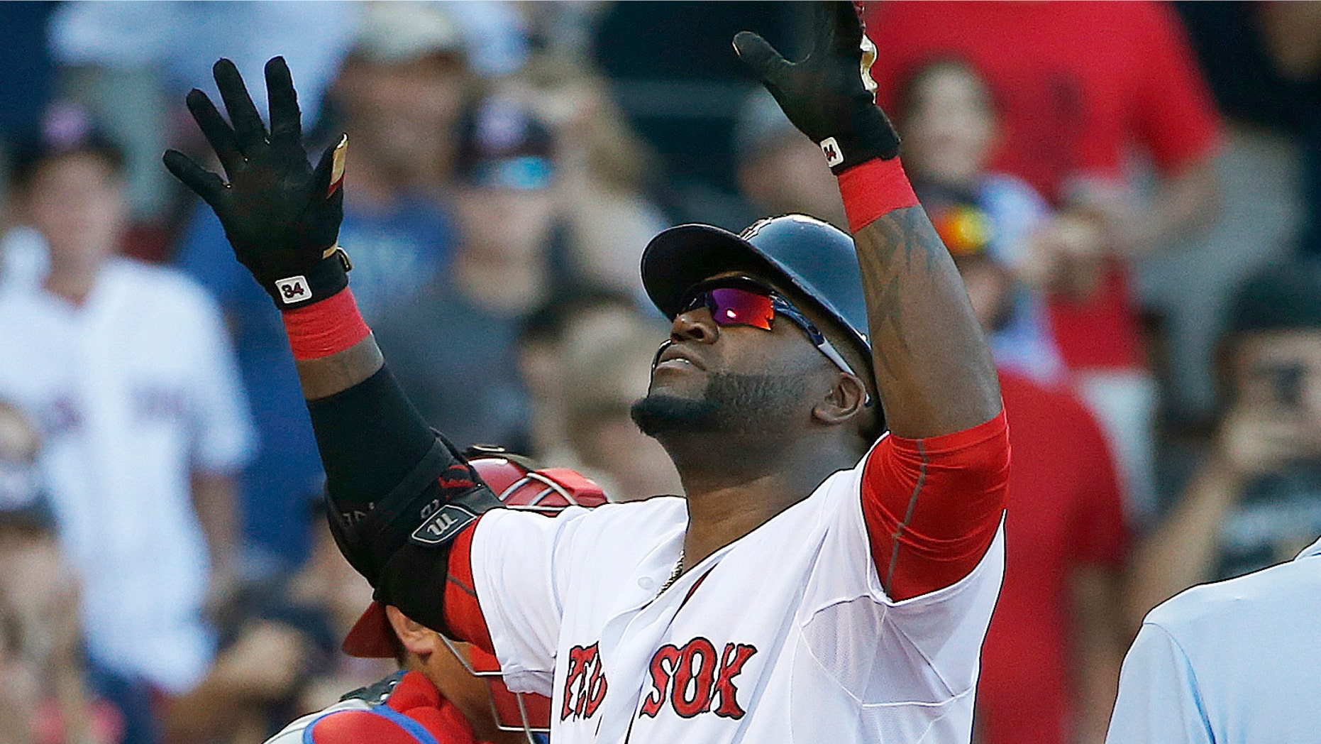 Boston Red Sox's David Ortiz celebrates his solo home run during the fourth inning of a baseball game against the Philadelphia Phillies in Boston, Saturday, Sept. 5, 2015. (AP Photo/Michael Dwyer)