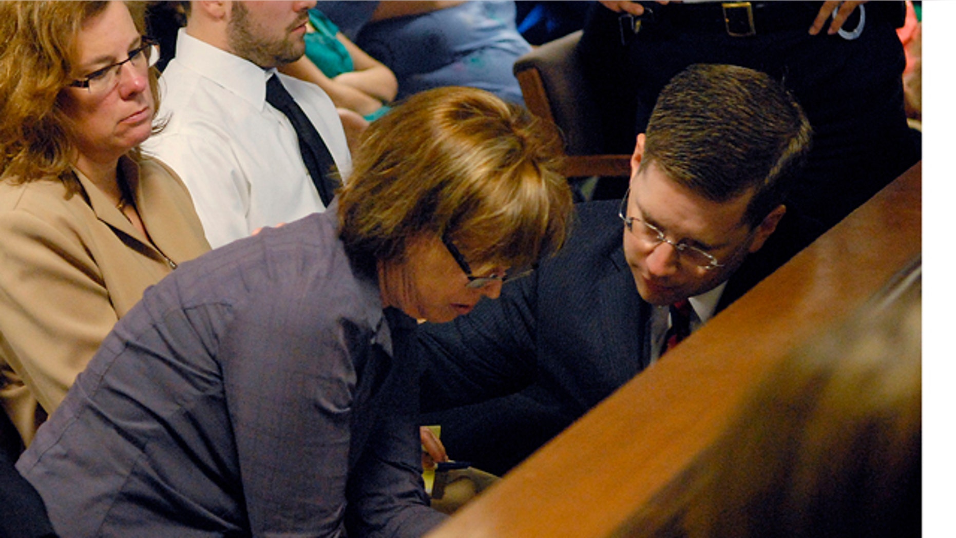 May 4: Anne O'Brien, mother of Phoebe Prince, talks with First Assistant District Attorney Steven Gagne during Kayla Narey's hearing where she admitted to sufficient facts of criminal harassment in Franklin - Hampshire Juvenile Court in Northampton, Mass.