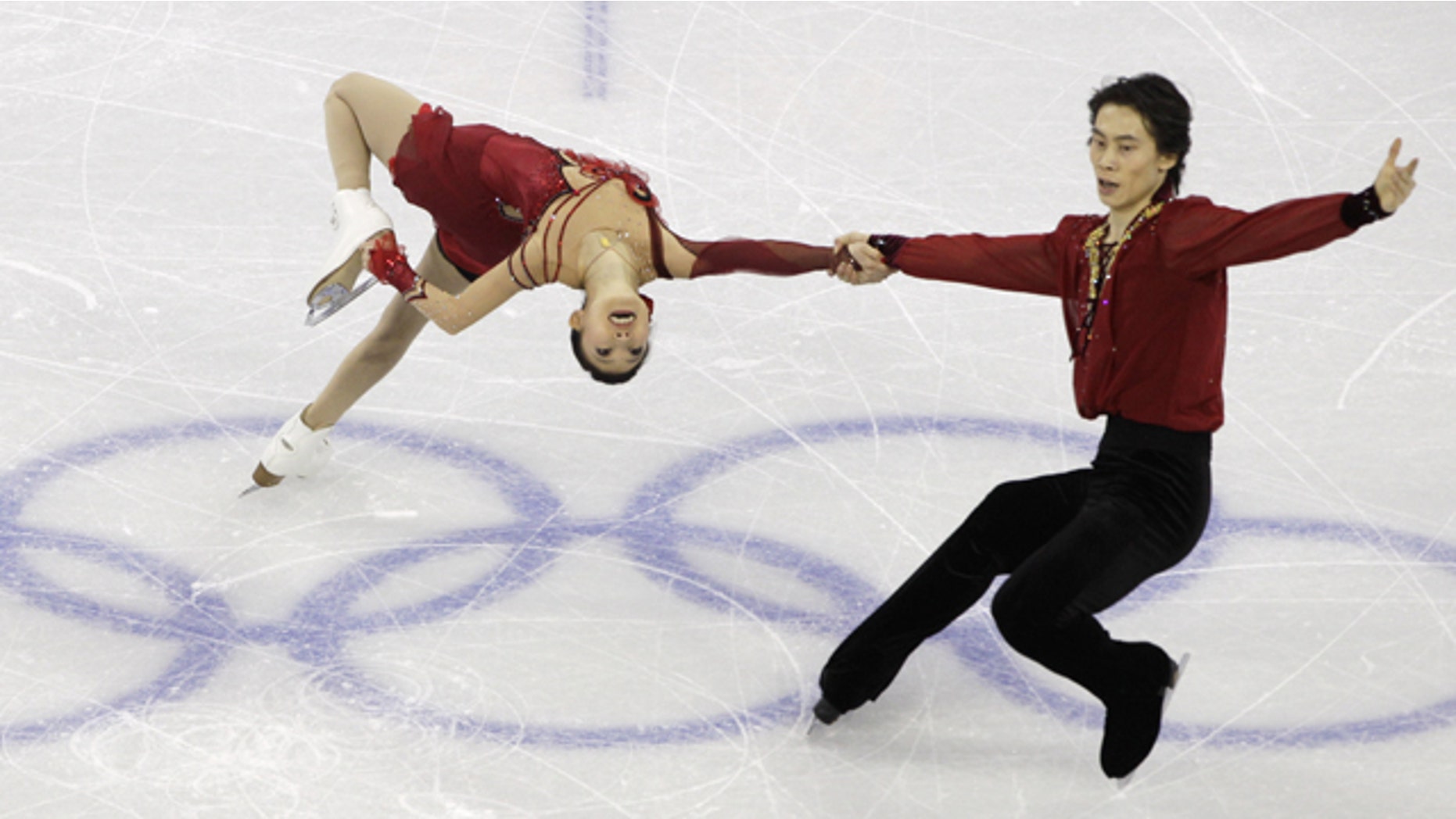 China's Pang Qing and Tong Jian perform their pairs free program during the figure skating competition at the Vancouver 2010 Olympics in Vancouver, British Columbia, Monday, Feb. 15, 2010.