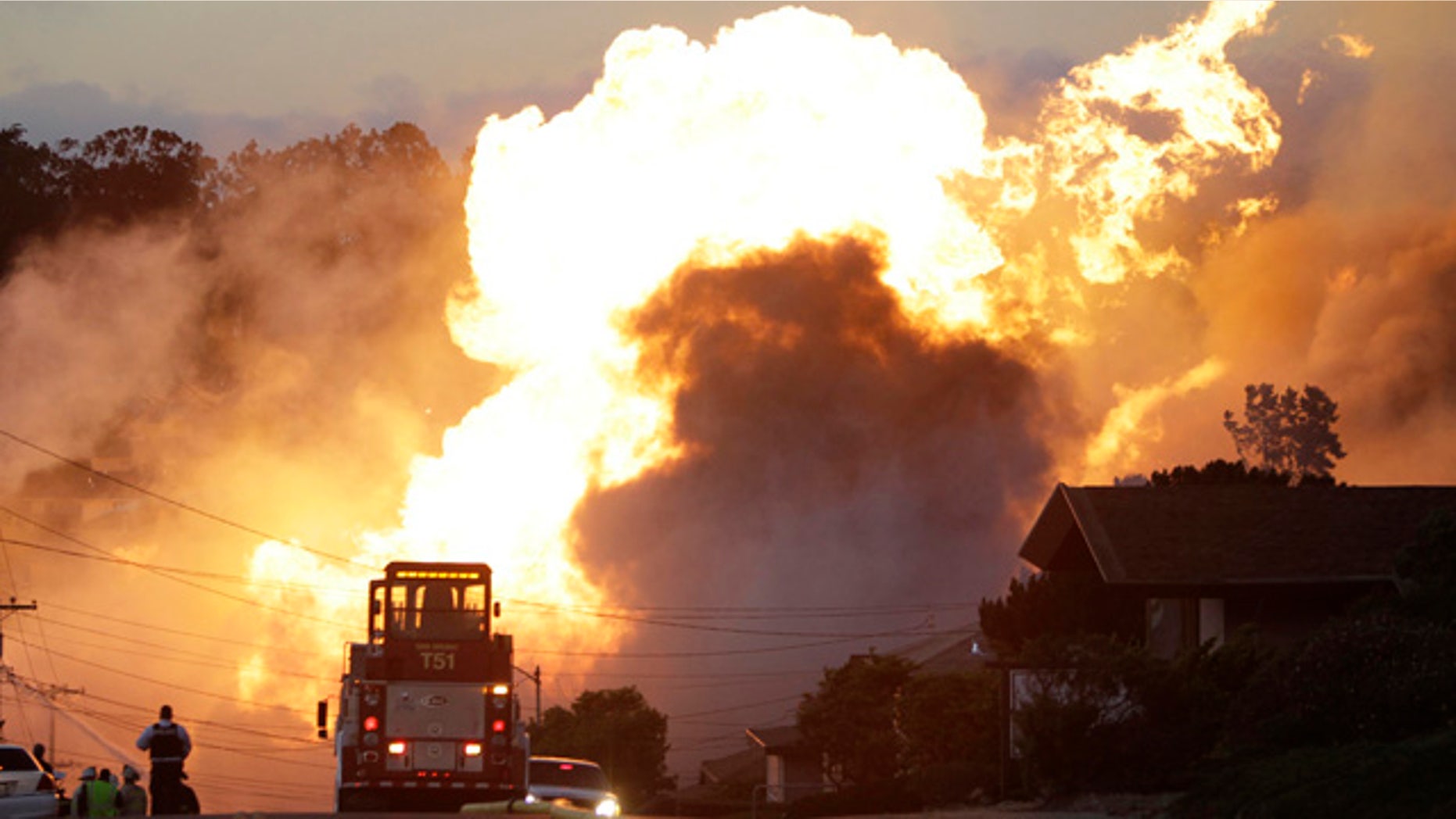 File - In this Sept. 9, 2010 file photo, a massive fire roars through a mostly residential neighborhood in San Bruno, Calif. (AP Photo/Paul Sakuma, File)