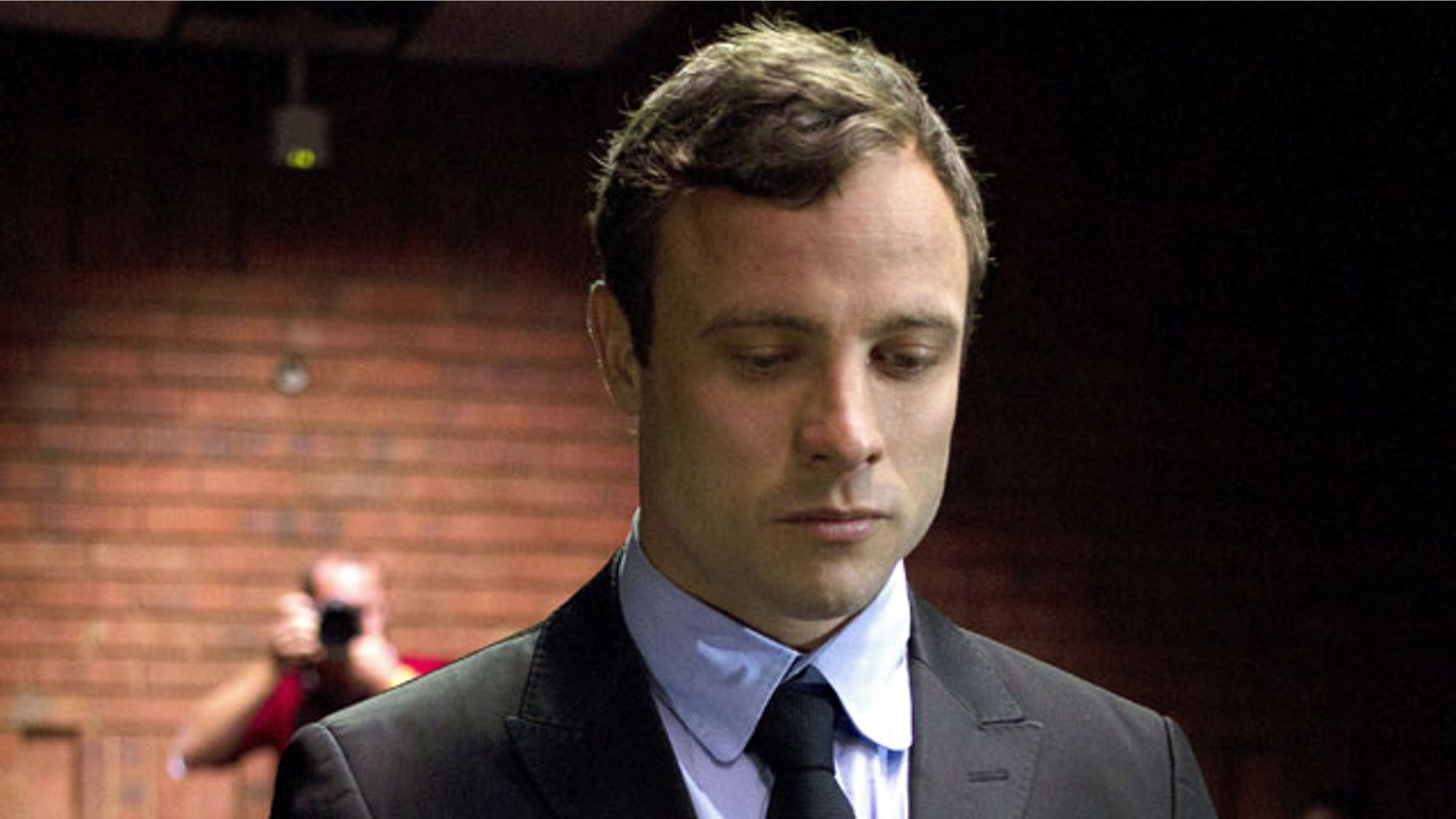 Aug, 19, 2013: Olympic and Paralympic athlete Oscar Pistorius is pictured here during a pre-trial hearing. (AP)