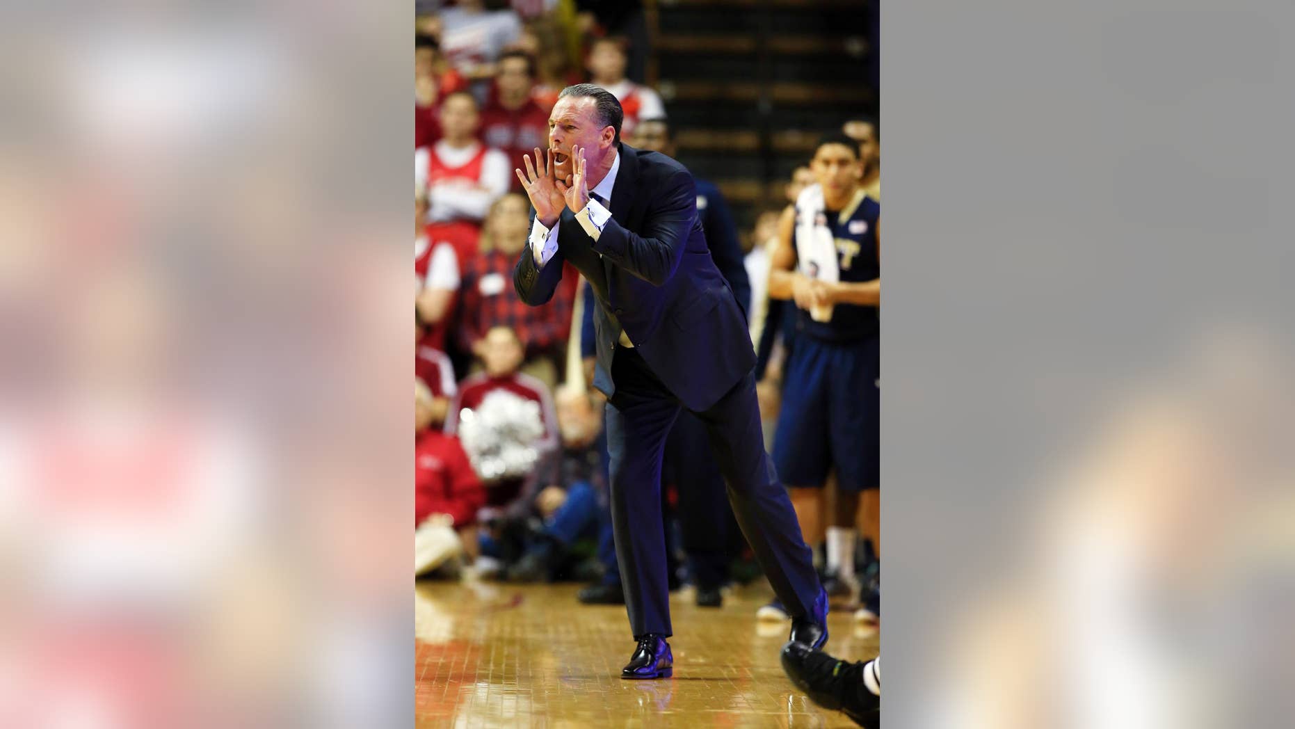Pittsburgh head coach Jamie Dixon yells instructions during the first half of an NCAA college basketball game against Indiana, Tuesday, Dec. 2, 2014, in Bloomington, Ind. (AP Photo/Darron Cummings)