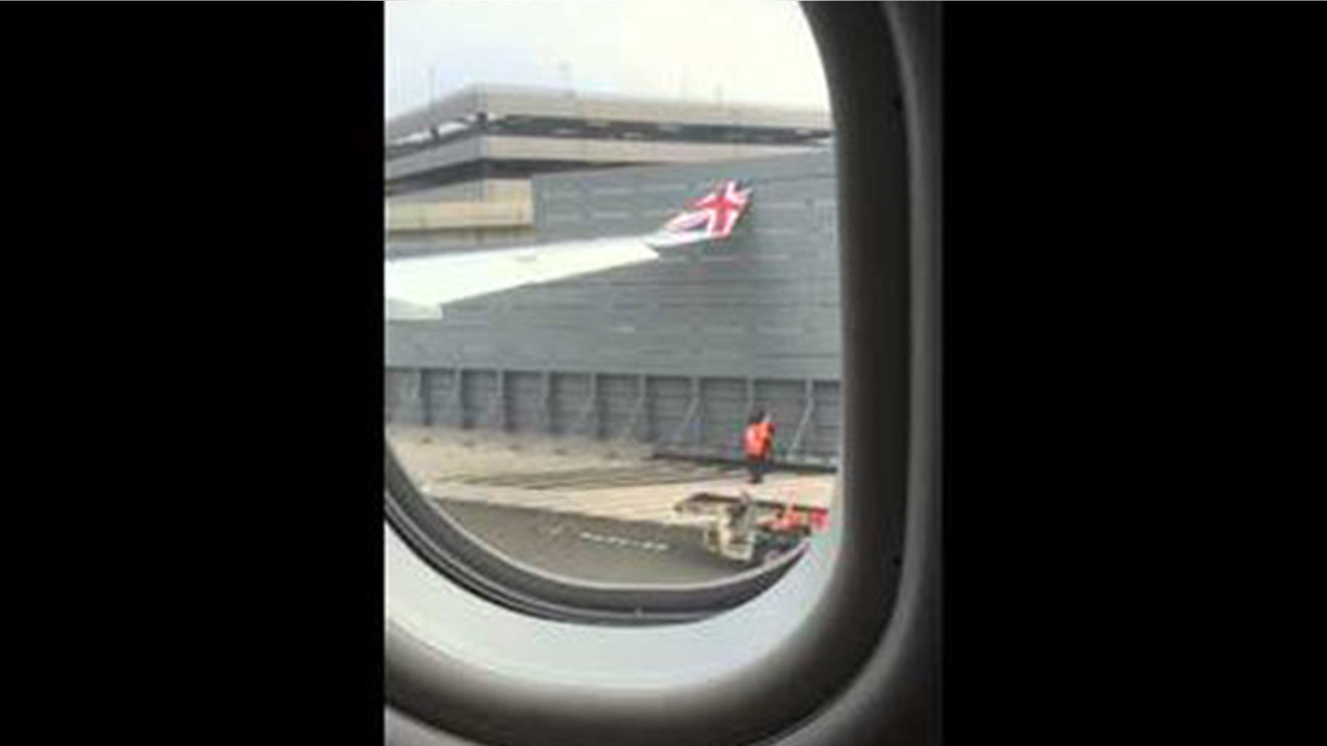 The wing of a London-bound flight made contact with a gate at New York's John F. Kennedy International Airport in this photo.