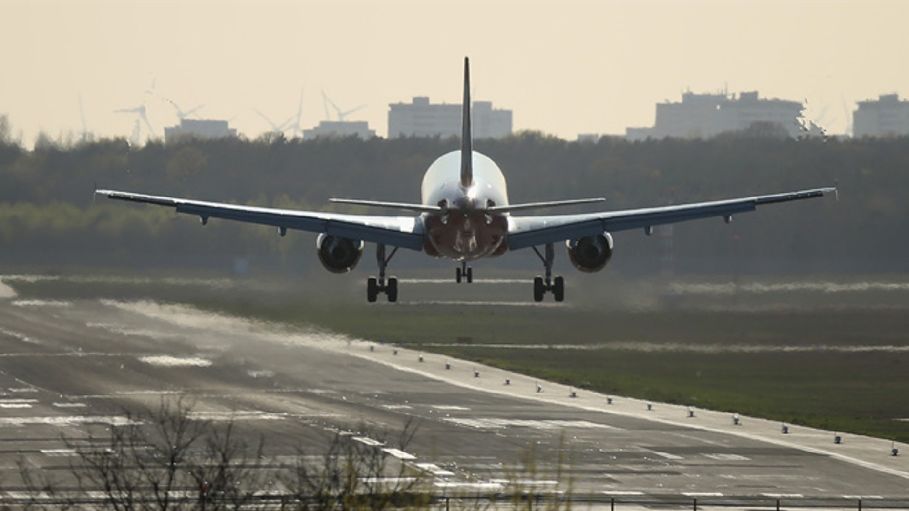 BERLIN, GERMANY - APRIL 21: A passenger plane arrives at Tegel Airport on April 21, 2016 in Berlin, Germany. No new date has yet been confirmed for the opening of the new BER Willy Brandt Berlin Brandenburg International Airport, which was originally supposed to open for operation in 2010, though recent media reports suggest March, 2018 as a possible date. The new airport, which was supposed to replace aging Tegel, has been plagued by poor management and planning, technical complications and corruption scandals. (Photo by Sean Gallup/Getty Images)