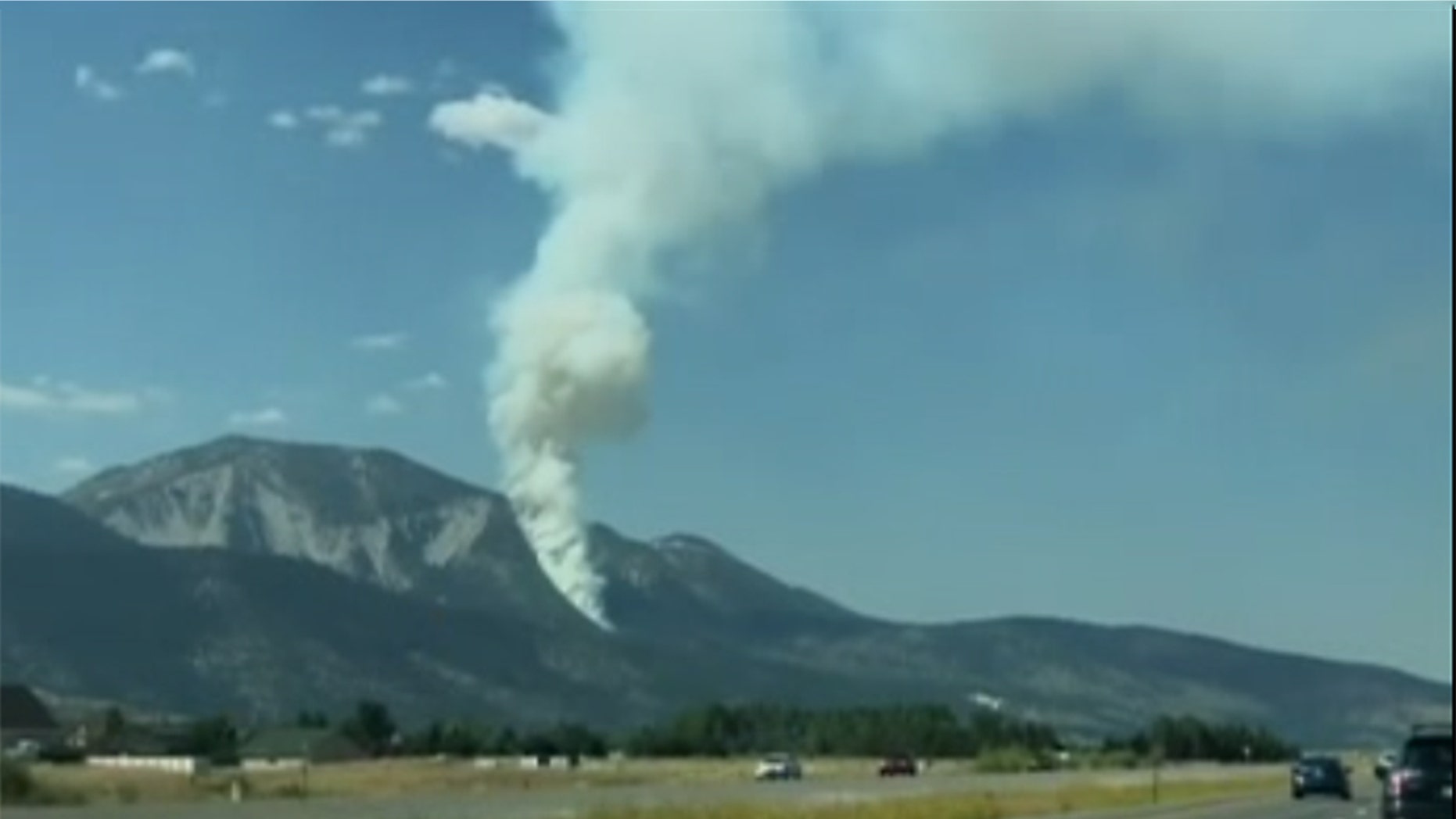 A small aircraft crashed Sunday on a rugged and scenic mountain south of Reno, igniting a wildfire in Nevada. (Kris Swaczyna via Storyful)
