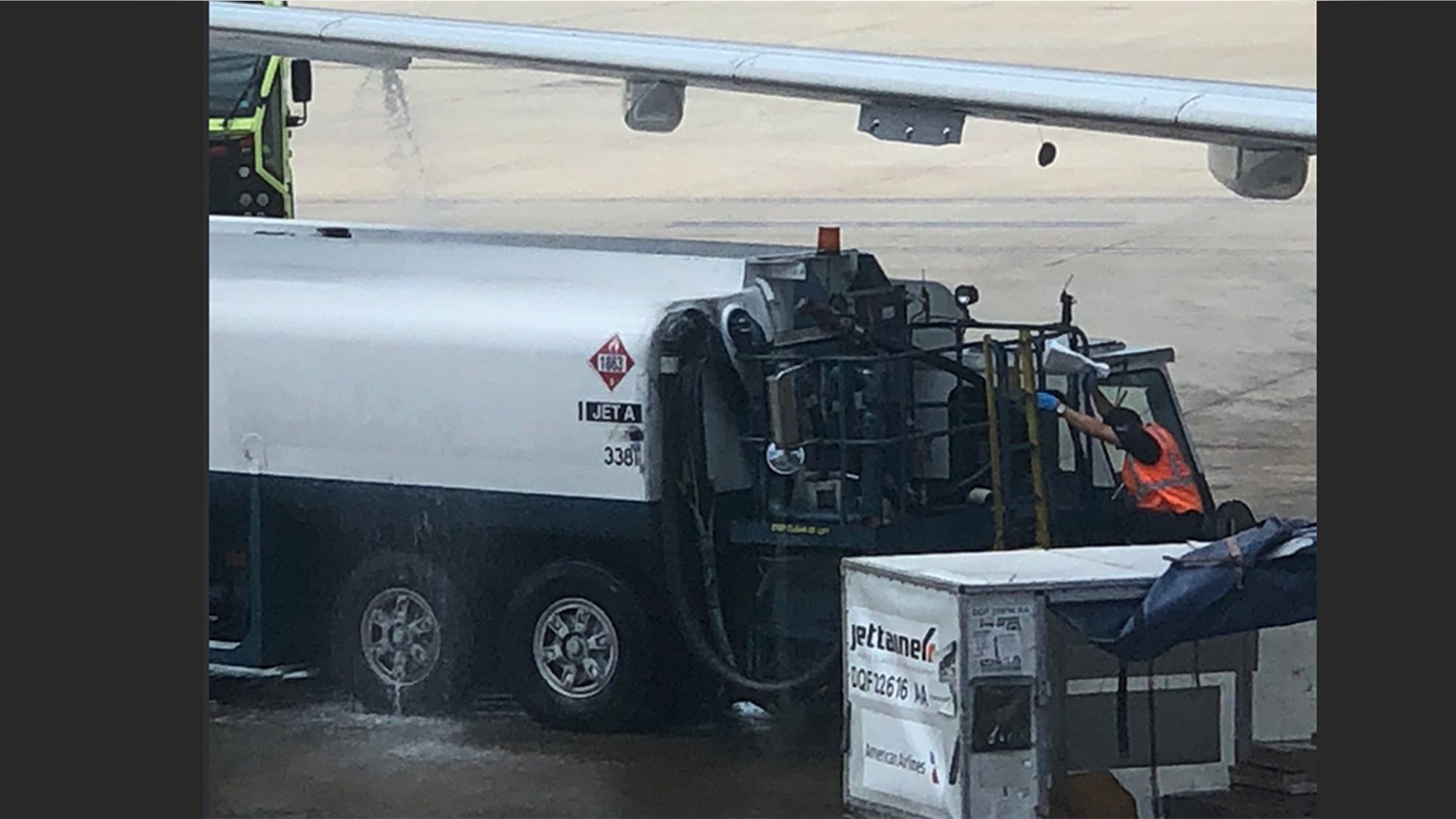 An American Airlines flight was delayed after fuel was seen leaking from the plane wing.