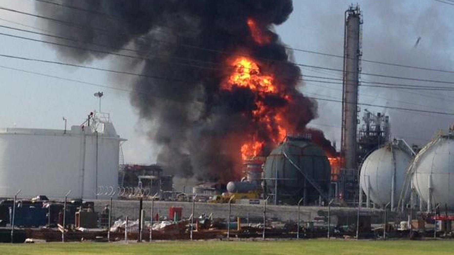 June 13, 2013: This photo provided by Ryan Meador shows an explosion at The Williams Companies Inc. plant in the Ascension Parish town of Geismar La.
